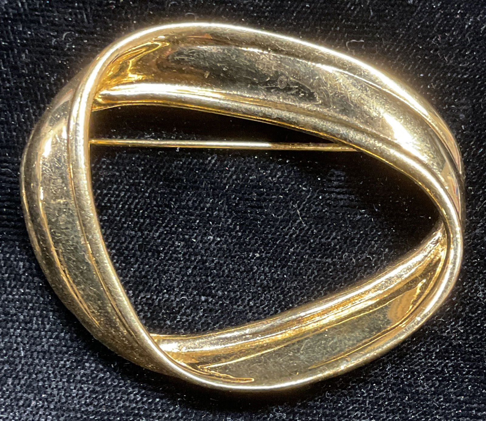 Vintage Monet Gold Tone Circle Brooch: Vintage signed Monet gold tone open circle brooch. Measures approx 2 inches wide. Some scratching. Jewelry, estate jewelry, costume jewelry, cocktail jewelry, fashion jewelry, accessories, fashion acc