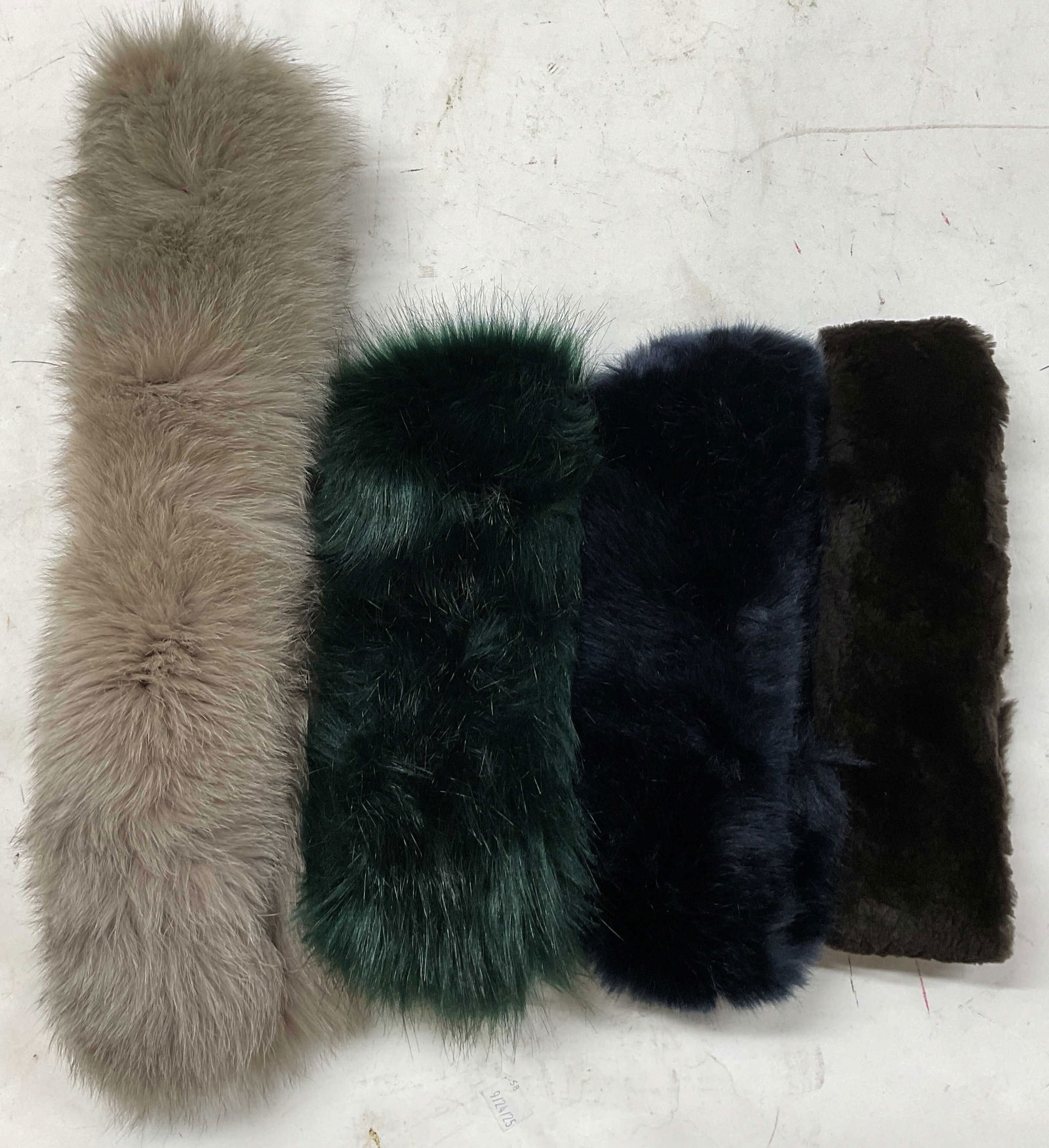 Lot 4 Max Mara+ Fur Headbands Italy: Lot of 4 headbands. Mix of fur and faux fur. Max Mara grey fur headband, made in Italy, fur material. Green faux fur headband, polyester material. The Hat Box brown faux fur headband, made in East Ham