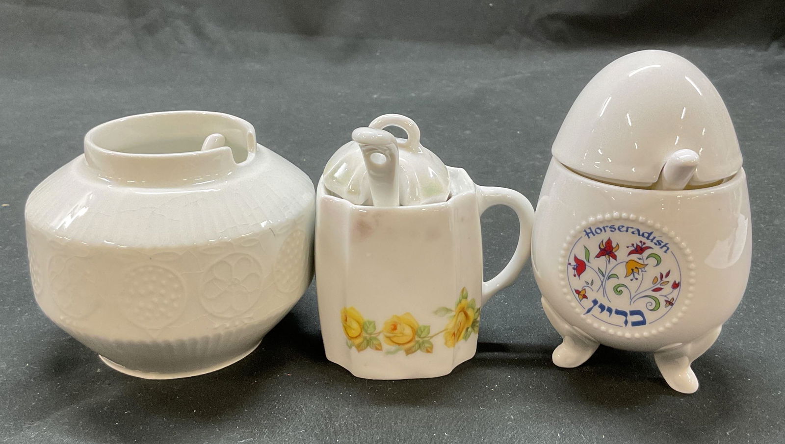 3 SGND Arabia Finland & More Porc Condiment Jars: Lot of 3 porcelain condiment jars with lids and spoons. Includes signed Arabia condiment jar with spoon, made in Finland. Signed and stamped on underside, reads as follows Arabia Made In Finland. Ribb