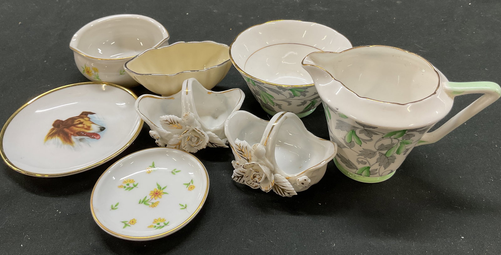 Grp Lot 8 SGND Tableware & Trinkets England+: Group lot of 8 porcelain tableware pieces, trinket dishes, and decorative figurines. Includes signed Royal Grafton Bone China bowl and creamer, made in England. Signed and stamped on underside, reads