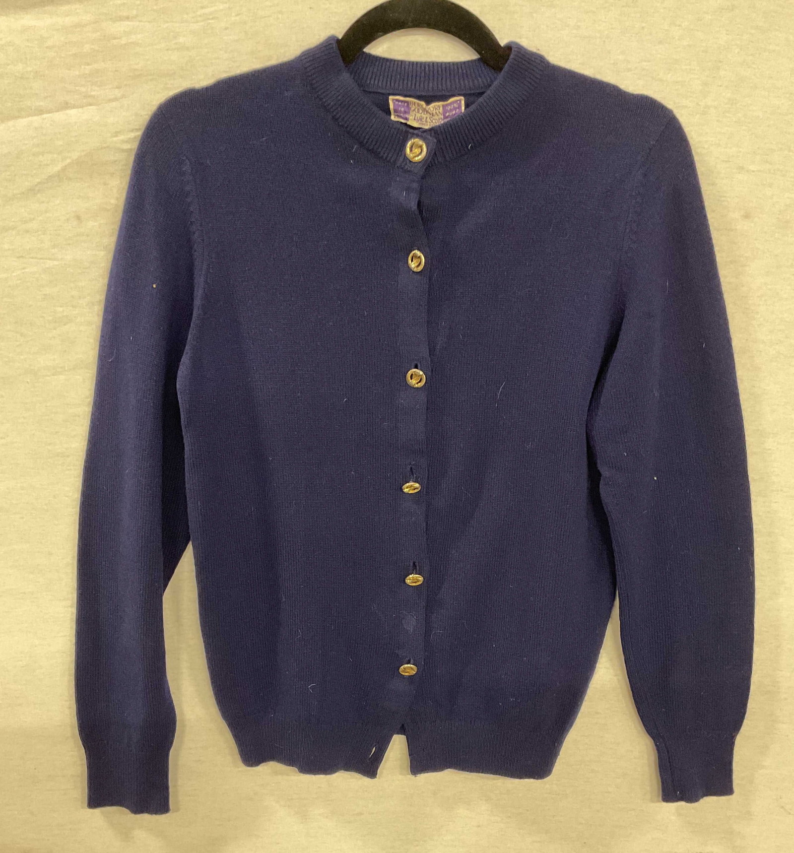 Vtg Lyle & Scott Blue Cashmere Cardigan: Vintage BERGDORF Goodman by Lyle and Scott blue cashmere cardigan sweater, gold tone decorative buttons. Made in Scotland. Measures approx 16 inches across chest. Some blemishes. One button needs repl