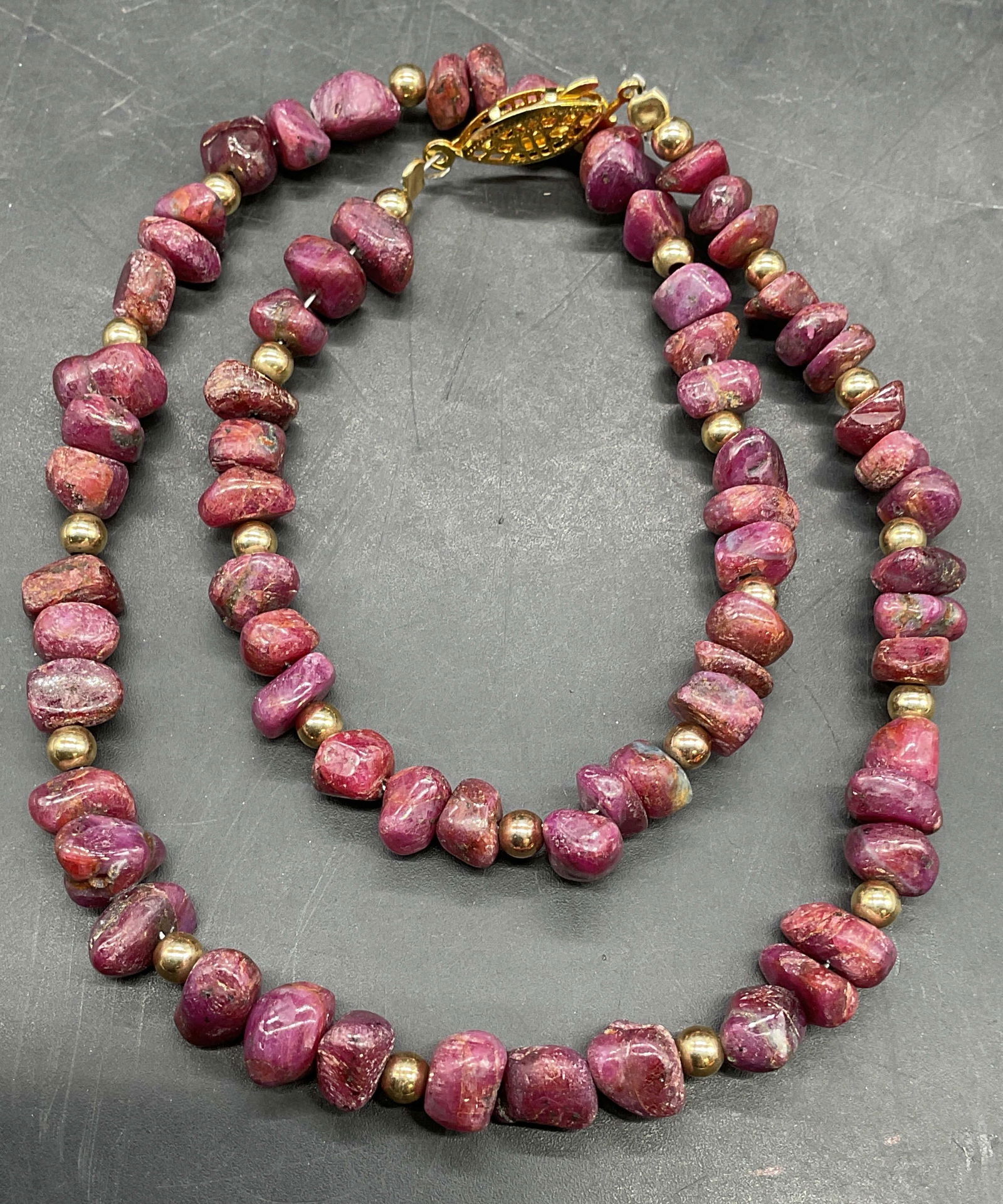 Vintage Purple Semiprecious Beaded Necklace: Vintage purple semiprecious stone beaded necklace with gold tone accents. Drop length approx 8 inches. Some scratching. Jewelry, estate jewelry, costume jewelry, cocktail jewelry, fashion jewelry, acc
