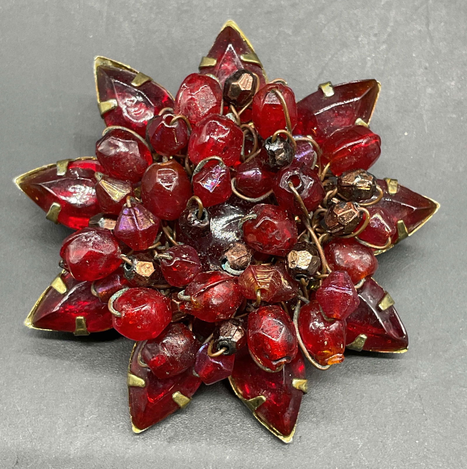 Vintage Red Lucite Crystal Flower Pendant: Vintage red lucite crystal flower motif pendant. Measures approx 2 inches wide. Some scratching. Jewelry, estate jewelry, costume jewelry, cocktail jewelry, fashion jewelry, accessories, fashion acces