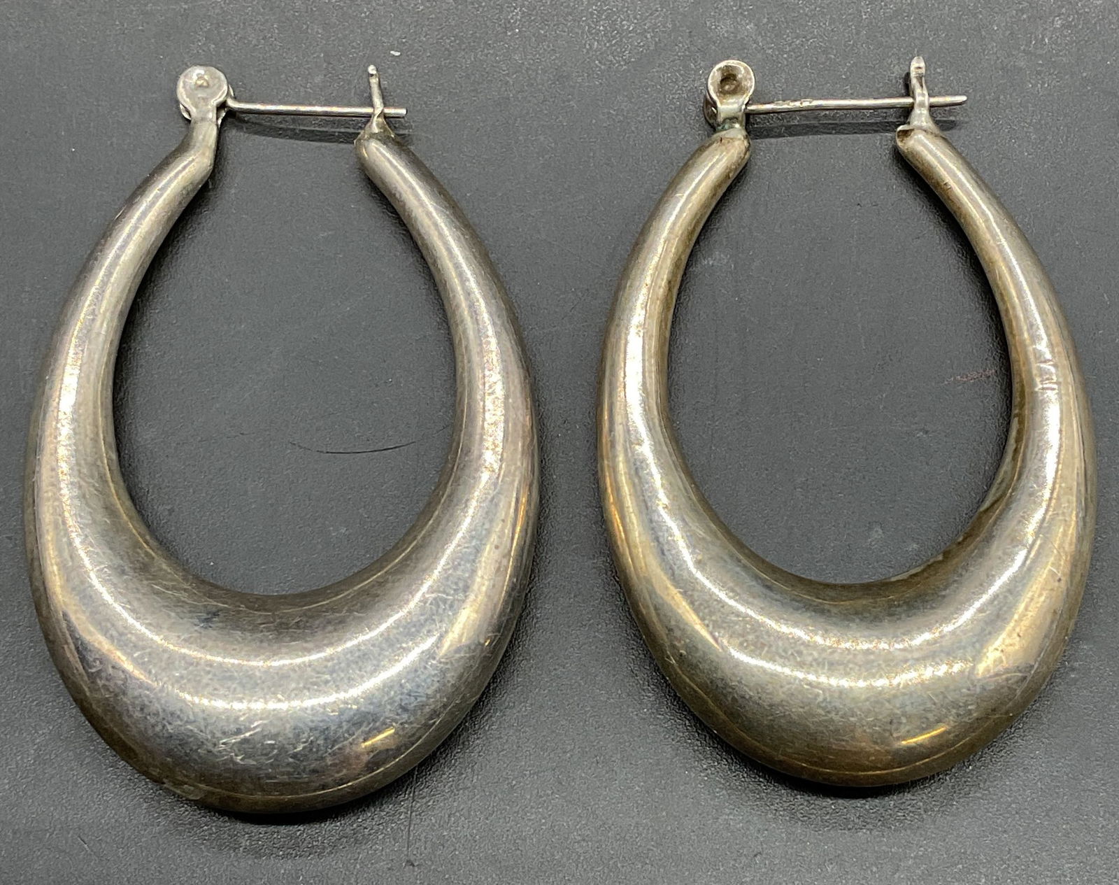 Vintage Sterling Silver Goop Earrings: Vintage sterling silver hoop earrings. Measures approx 1.5 x 1 inches. Total weight 7.8 grams. Some scratching. Jewelry, estate jewelry, fine jewelry, cocktail jewelry, fashion jewelry, accessories, f