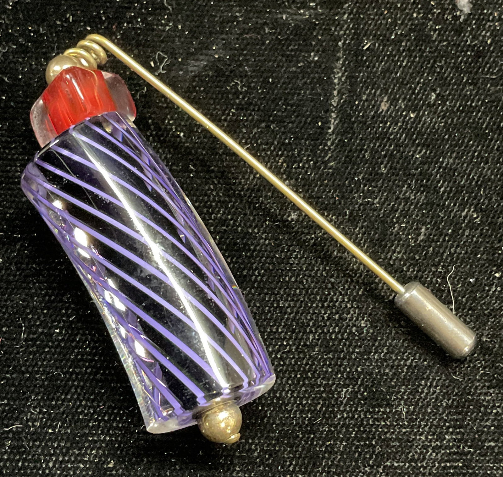Red Blue Stripe Art Glass Stick Pin: Red and blue toned art glass stick pin with striped swirl pattern. Measures approx 2.25 inches long. Some wear including scratching. Jewelry, estate jewelry, costume jewelry, cocktail jewelry, fashion