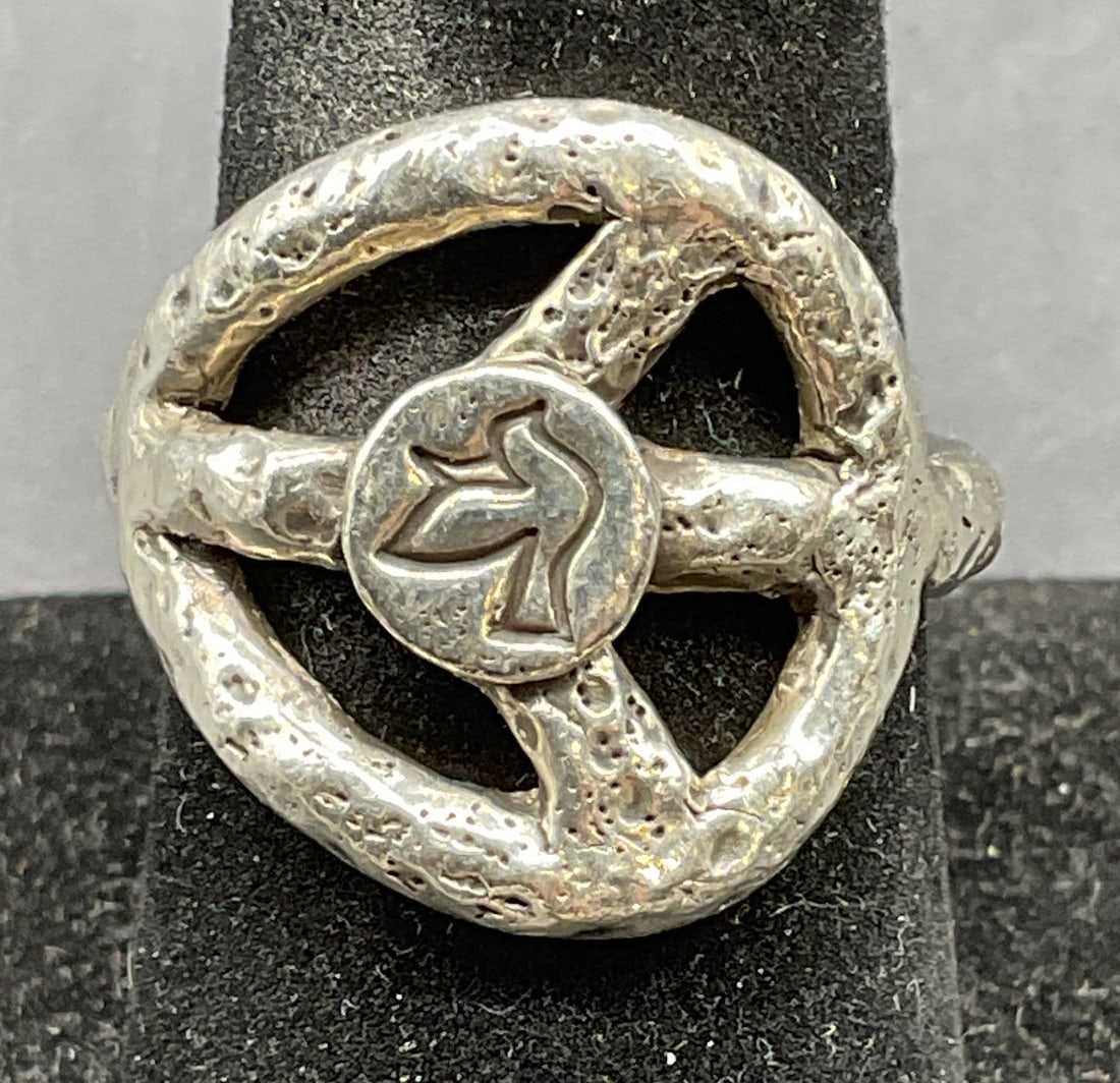 Vintage Sterling Silver Peace Dove Ring: Vintage sterling silver peace sign and dove motif ring. Size 7.75. Total weight 7.3 grams. Tests for sterling using acid test. Some scratching. Jewelry, estate jewelry, fine jewelry, cocktail jewelry,