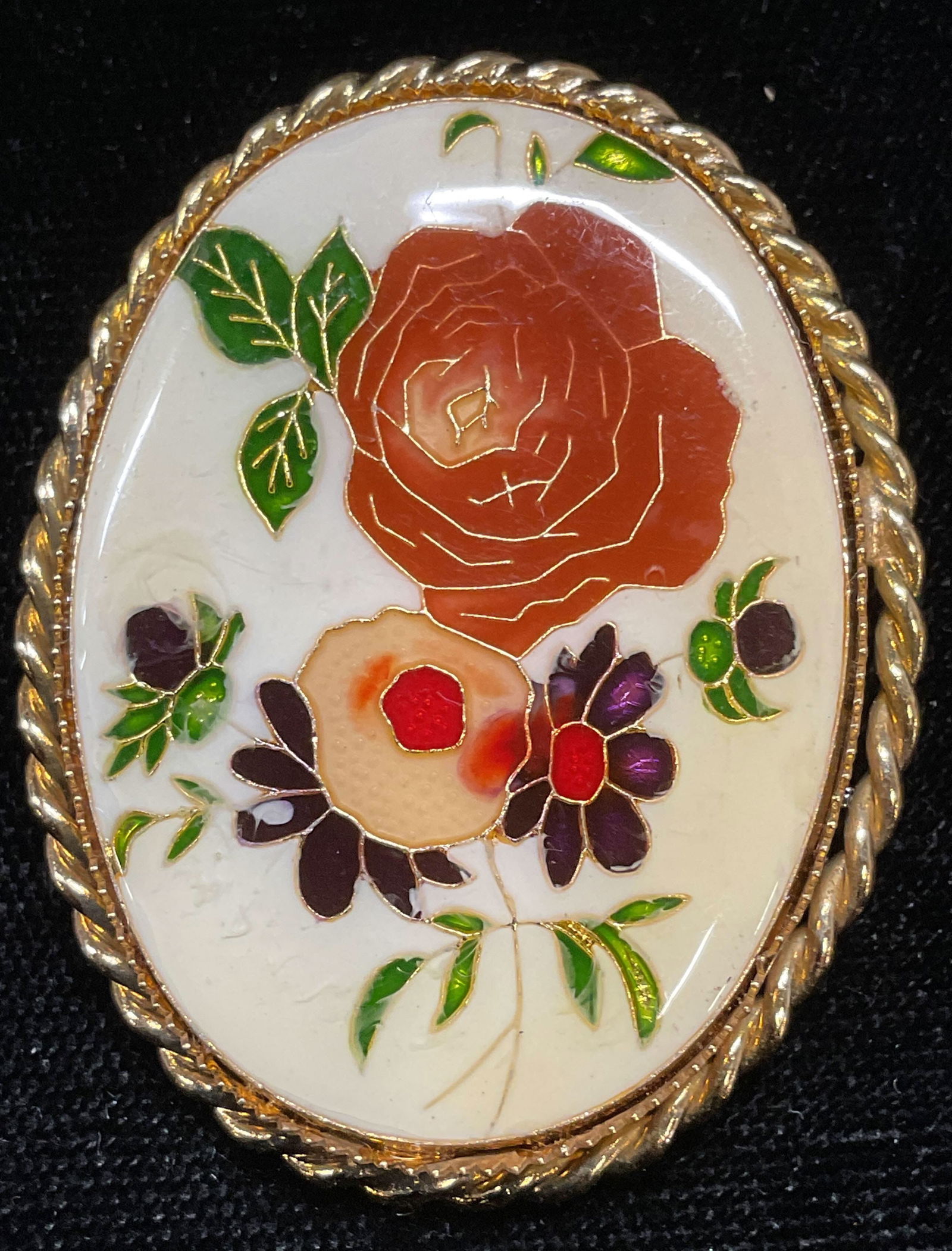 Vintage Gold Tone Enameled Flower Brooch: Vintage gold tone enameled flower motif brooch. Measures approx 1.75 x 1.25 inches. Some scratching. Jewelry, estate jewelry, costume jewelry, cocktail jewelry, fashion jewelry, accessories, fashion a