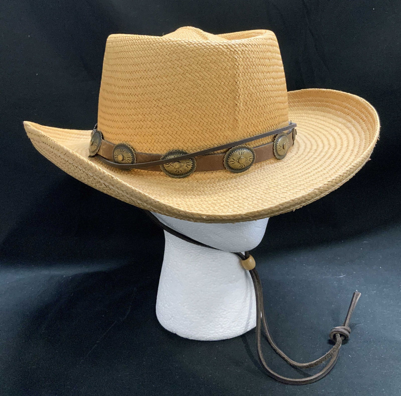 Tree Eagle Santa Fe Genuine Panama Hat: Hat is genuine Panama & features a brown leather hatband adorned with metal conchos. Intricate detailing. Size Large. Signed & marked. Reads, TREE EAGLE SANTA FE. Surface wear consistent to age, use &