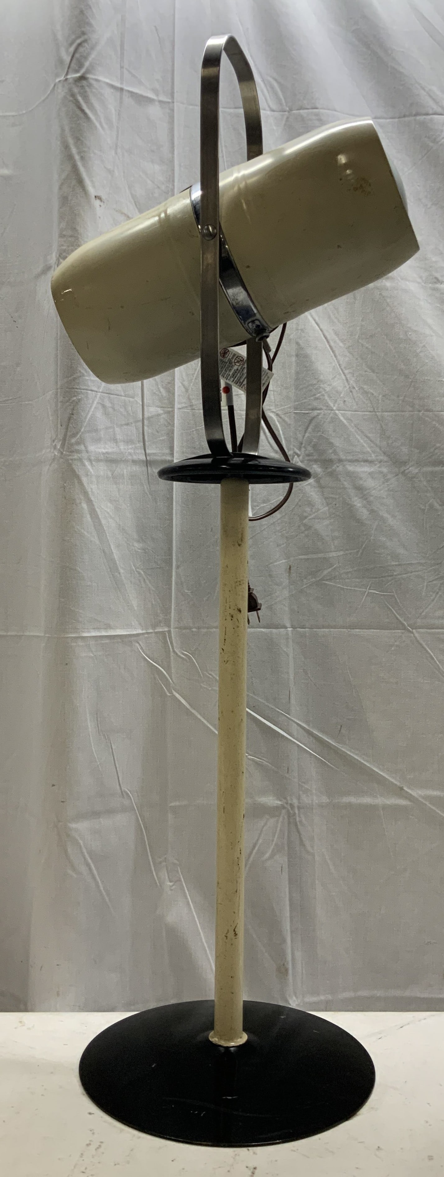 Vtg Westing House Industrial Floor Lamp 41.7in: Vintage metal Westinghouse industrial floor lamp. Black & white tone. Circular base & lamp head is suspended within a metal hoop frame. Signed & marked. Reads, WESTING HOUSE. Surface wear consistent t
