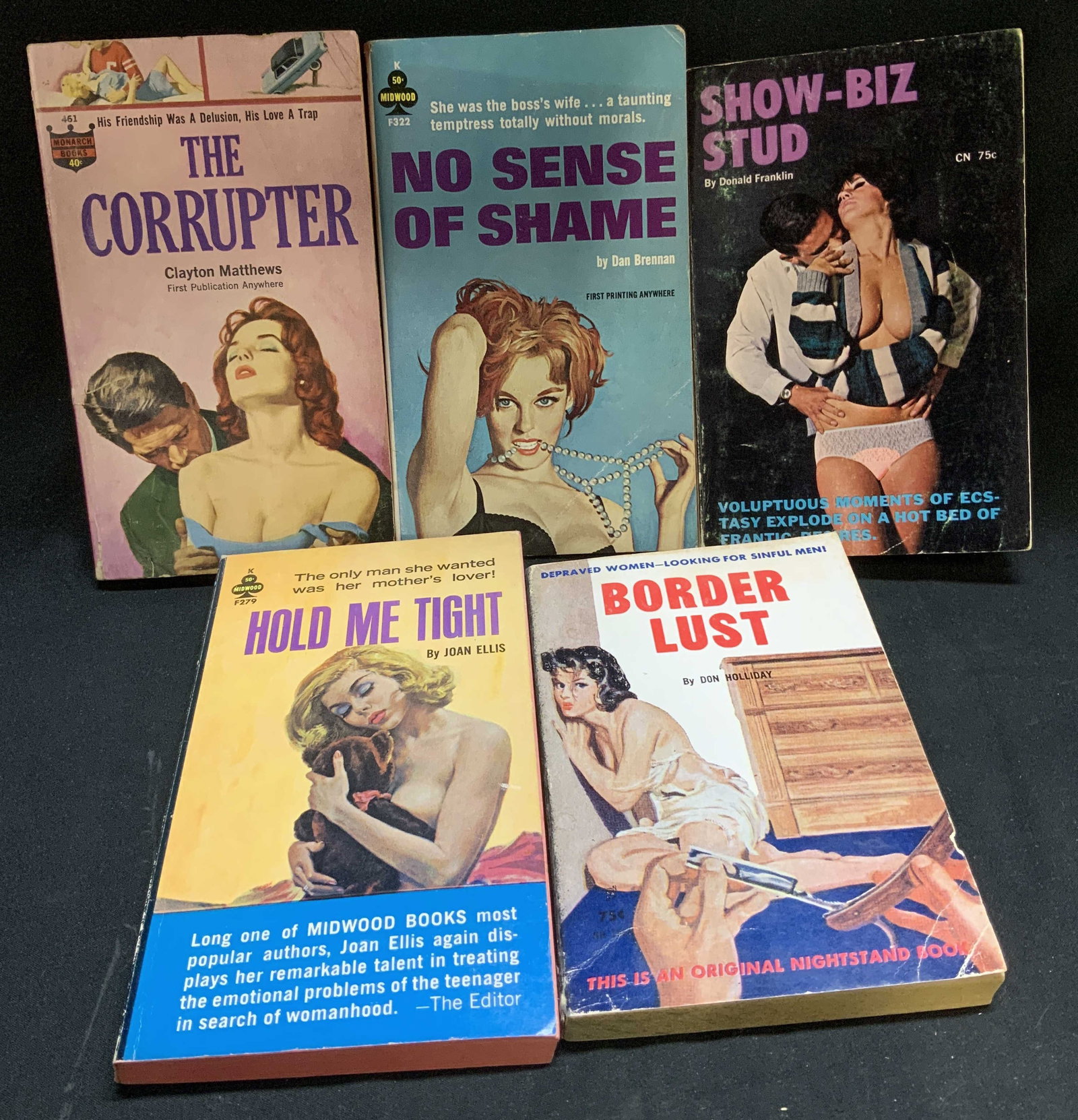 Lot 5 Pulp Fiction Erotica 1960s Books MATTHEWS+: Lot includes, The Corrupter by Clayton Matthews (1964), No Sense of Shame by Dan Brennan (1963), Show-Biz Stud by Donald Franklin (1965), Hold Me Tight by Joan Ellis (1963) & Border Lust by Don Hollid