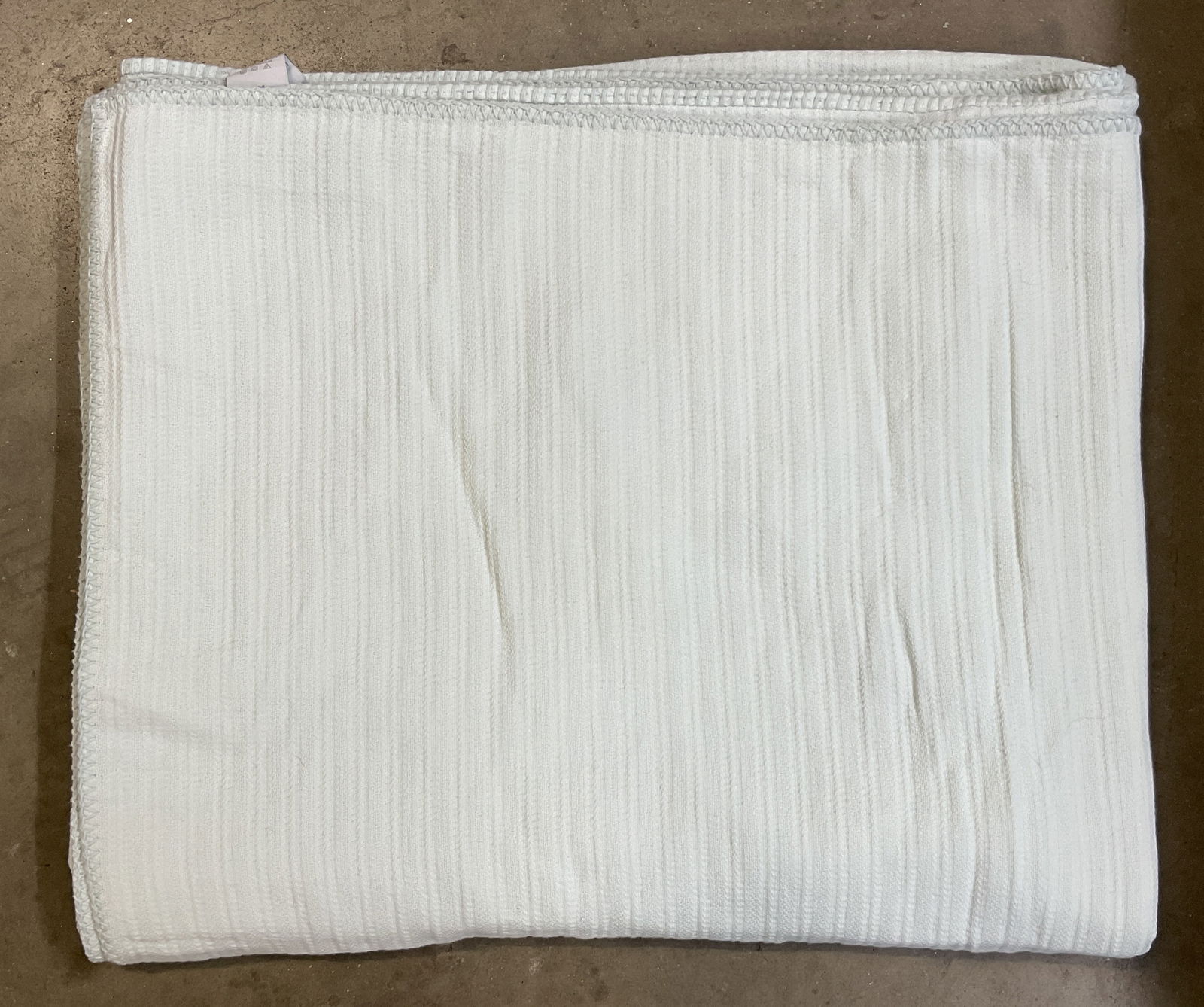 Restoration Hardware Blue Blanket Greece: Restoration Hardware blue blanket. Made in Greece. Cotton material. Unique stitched trim. Ribbed design. Measures approx 46 x 54 inches. Some blemishes observed and surface wear consistent with exposu