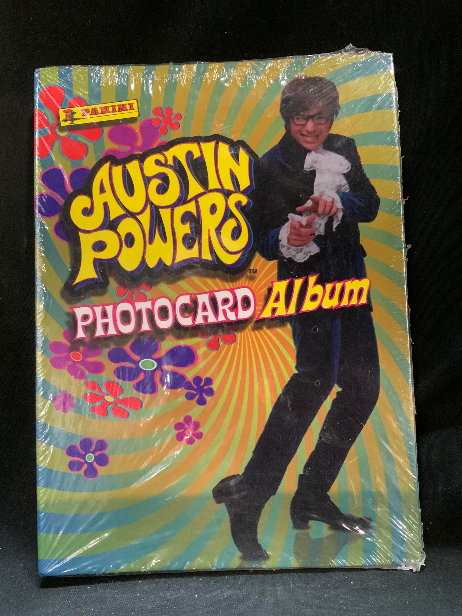 1999 Panini Austin Powers Photocard Album NIP: 1999 Panini Austin Powers Photocard Album. New in plastic. A collectible album for trading cards. Surface wear consistent to age, use & exposure. Measurements: length 9in x width 6.6in. 1999 panini Au