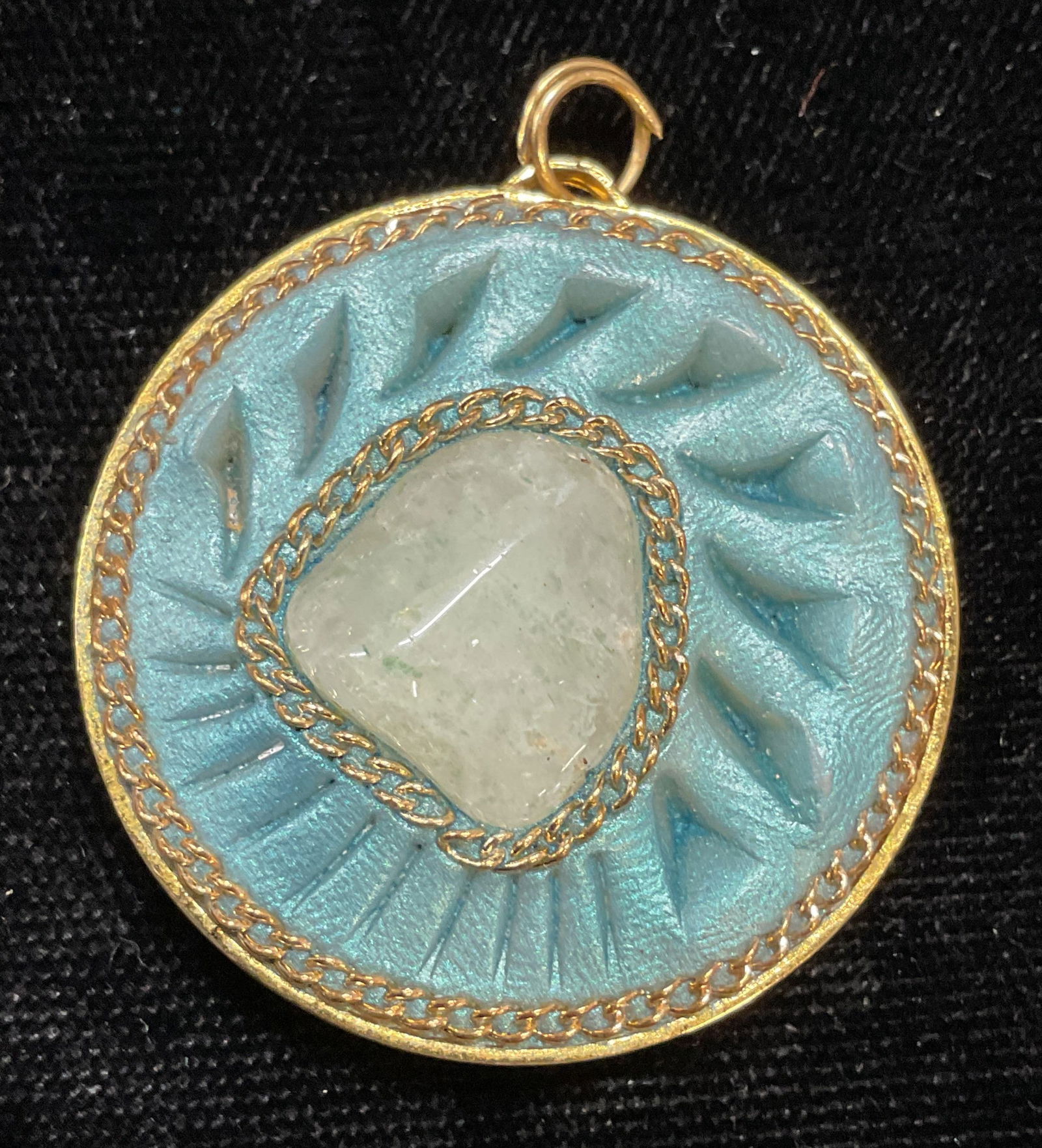 Gold Tone Blue Semiprecious Pendant: Gold tone pendant with iridescent blue and semiprecious stone decoration. Measures approx 1.25 inches wide. Some scratching. Jewelry, estate jewelry, costume jewelry, cocktail jewelry, fashion jewelry