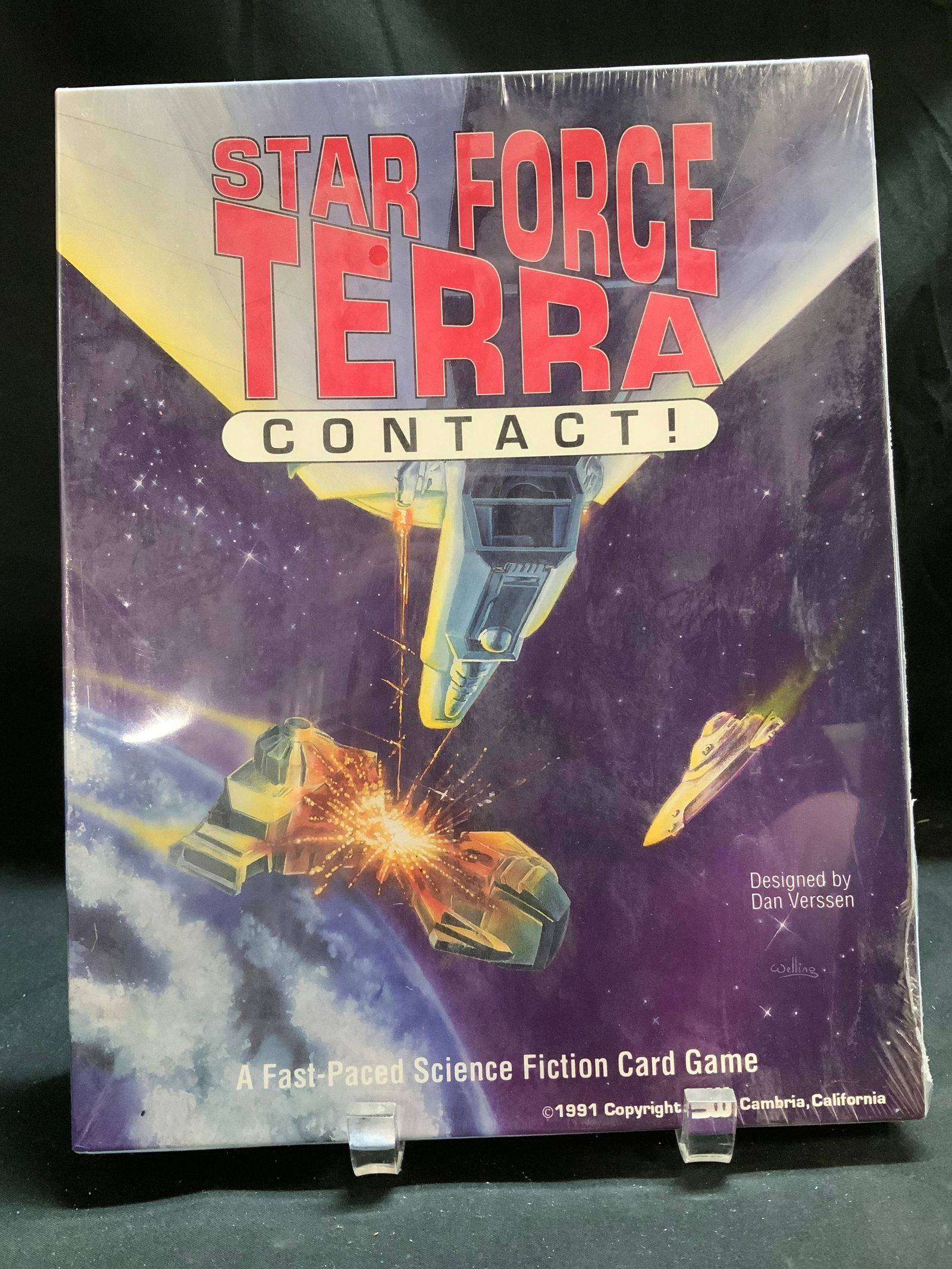 1991Vntg Star Force Terra Contact Fiction Game NIP: Star Force Terra Contact! Designed by Dan Verssen. A Fast-Paced Science Fiction card game. Copyright 1991. New in plastic. Has not been opened. Surface wear consistent to age, use & exposure. Measurem