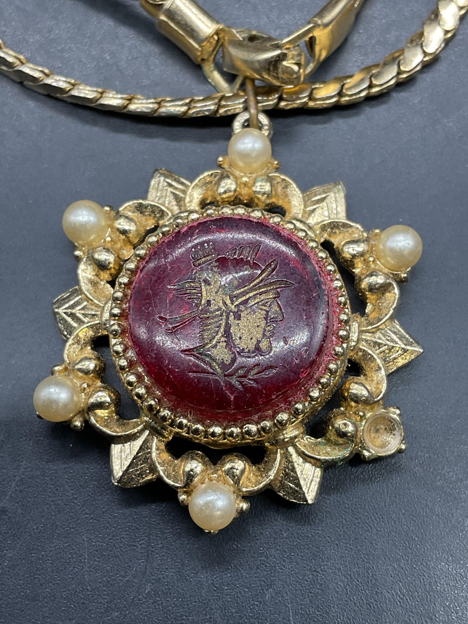 Vintage Coro Gold Tone Chain Necklace: Vintage signed Coro gold tone chain necklace with vintage gold tone red faux pearl pendant. Drop length approx 7 inches. Some scratching. Jewelry, estate jewelry, costume jewelry, cocktail jewelry, fa