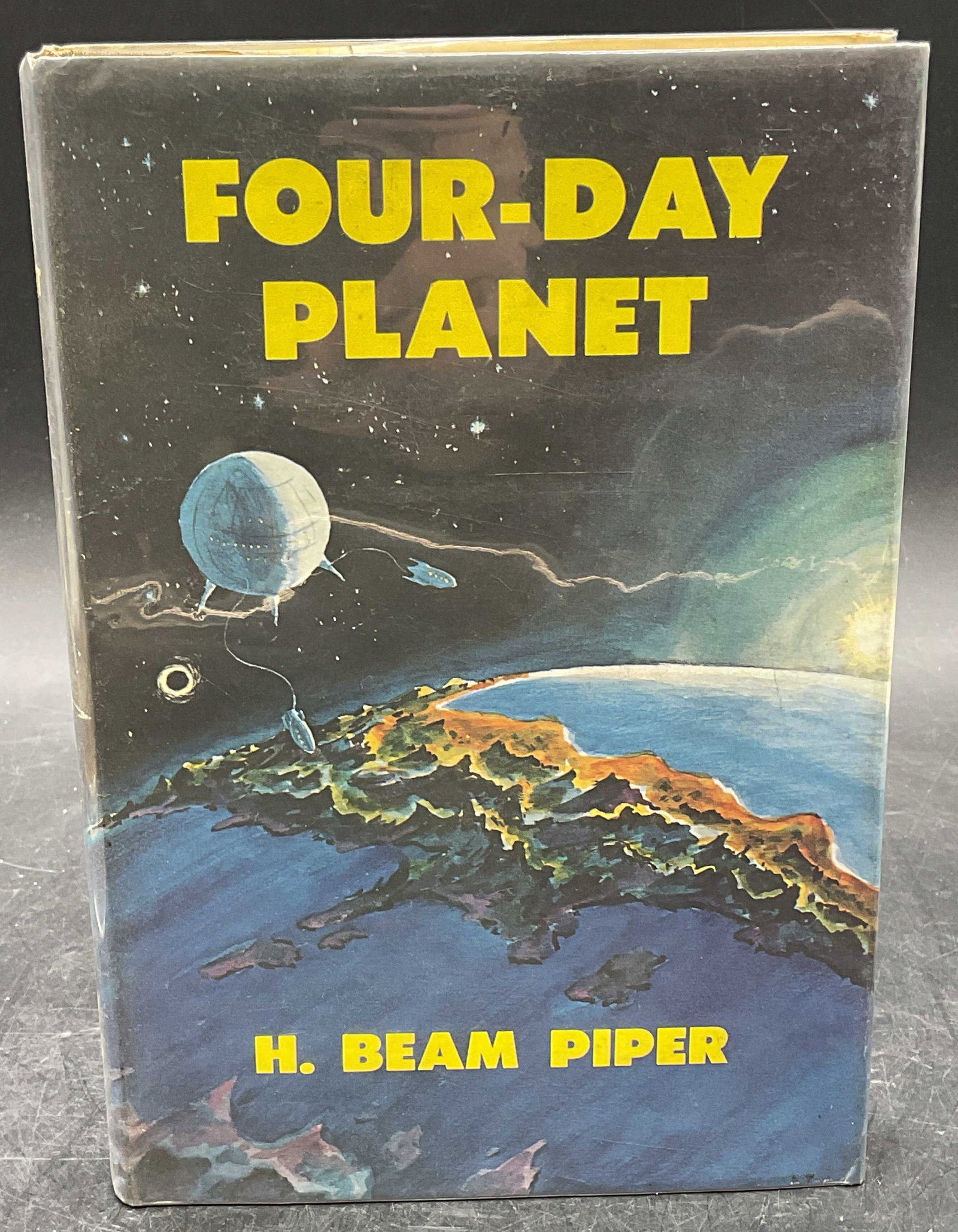 H Beam Piper Four Day Planet 1st Ed 1961: Hardcover copy of Four Day Planet by H Beam Piper. First edition. Published by Putnam, 1961. Measures approx 8.25 x 5.5 inches. Some wear to cover, pages, and binding consistent with exposure. Book, c