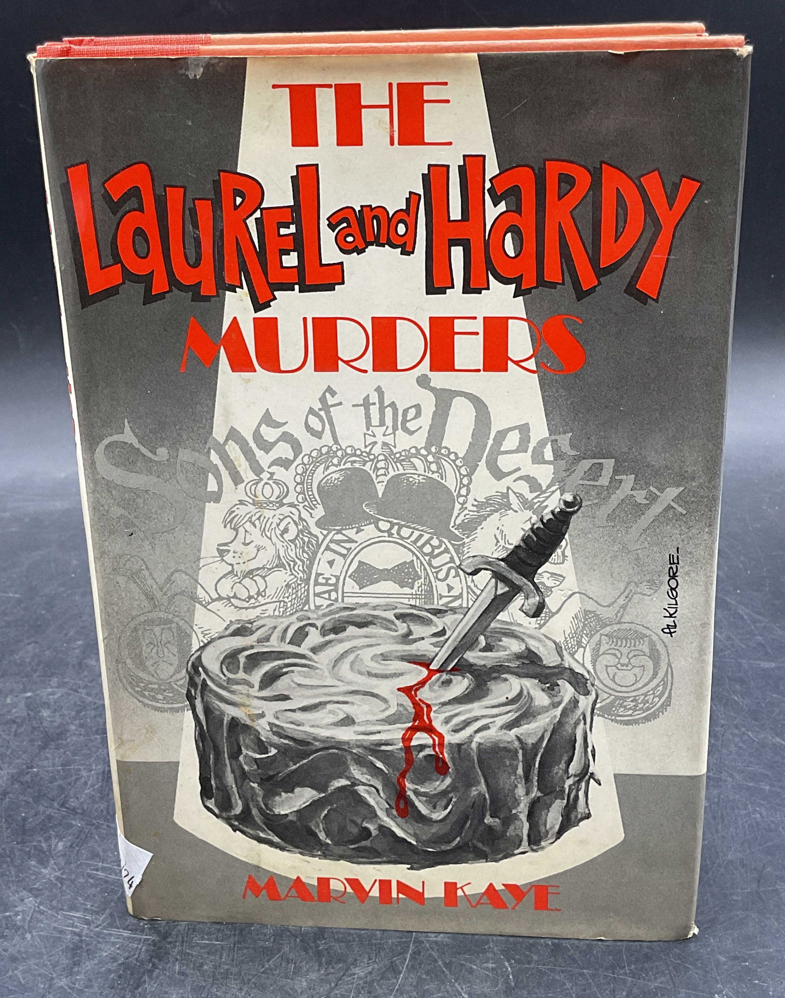 Marvin Kaye Laurel & Hardy Murders 1st Ed 1977: Hardcover copy of The Laurel & Hardy Murders by Marvin Kaye. First edition. Published by Dutton, 1977. Measures approx 8.5 x 5.75 inches. Some wear to cover, pages, and binding consistent with exposur