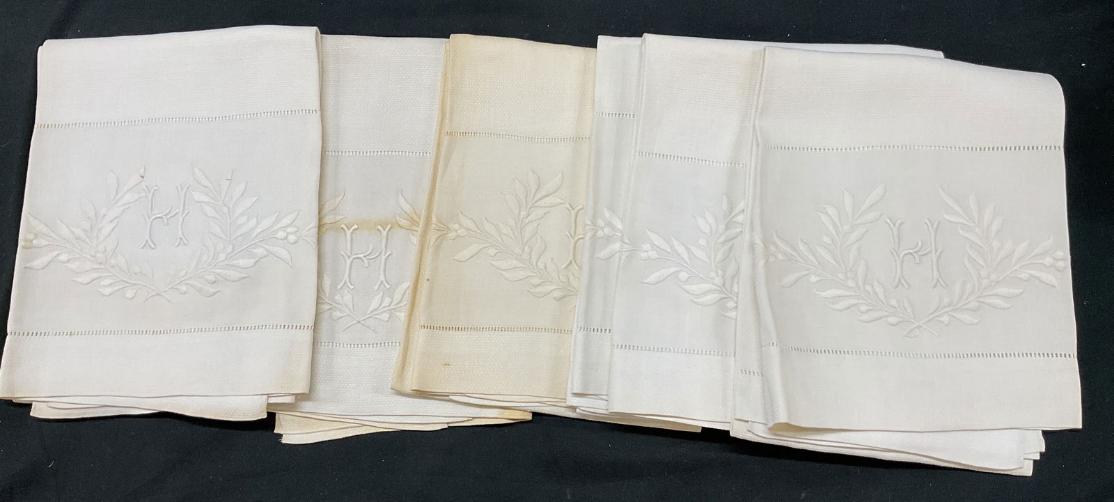 Set 6 Vintage White Linen Monogram Tea Towels: Set of 6 vintage white linen embroidered monogram tea towels. Linen material. Embroidered leaves motif. Embroidered monogram featuring the letter H. Measures approx 24 x 42 inches. Blemishes and disco
