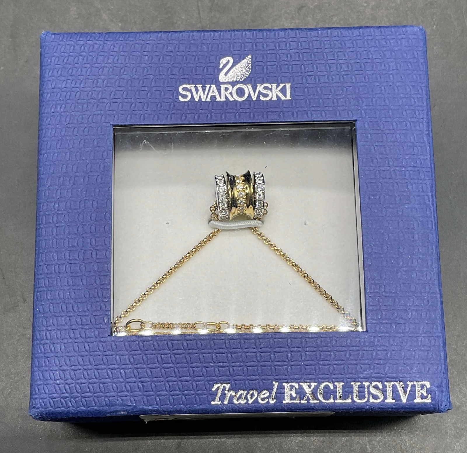 Swarovski Gold Tn Crystal Pendant Necklace NIB: New in box Swarovski crystal gold tone pendant necklace. Not examined out of box. Pendant approx .25 inches wide. Some wear to box. Jewelry, estate jewelry, costume jewelry, cocktail jewelry, fashion