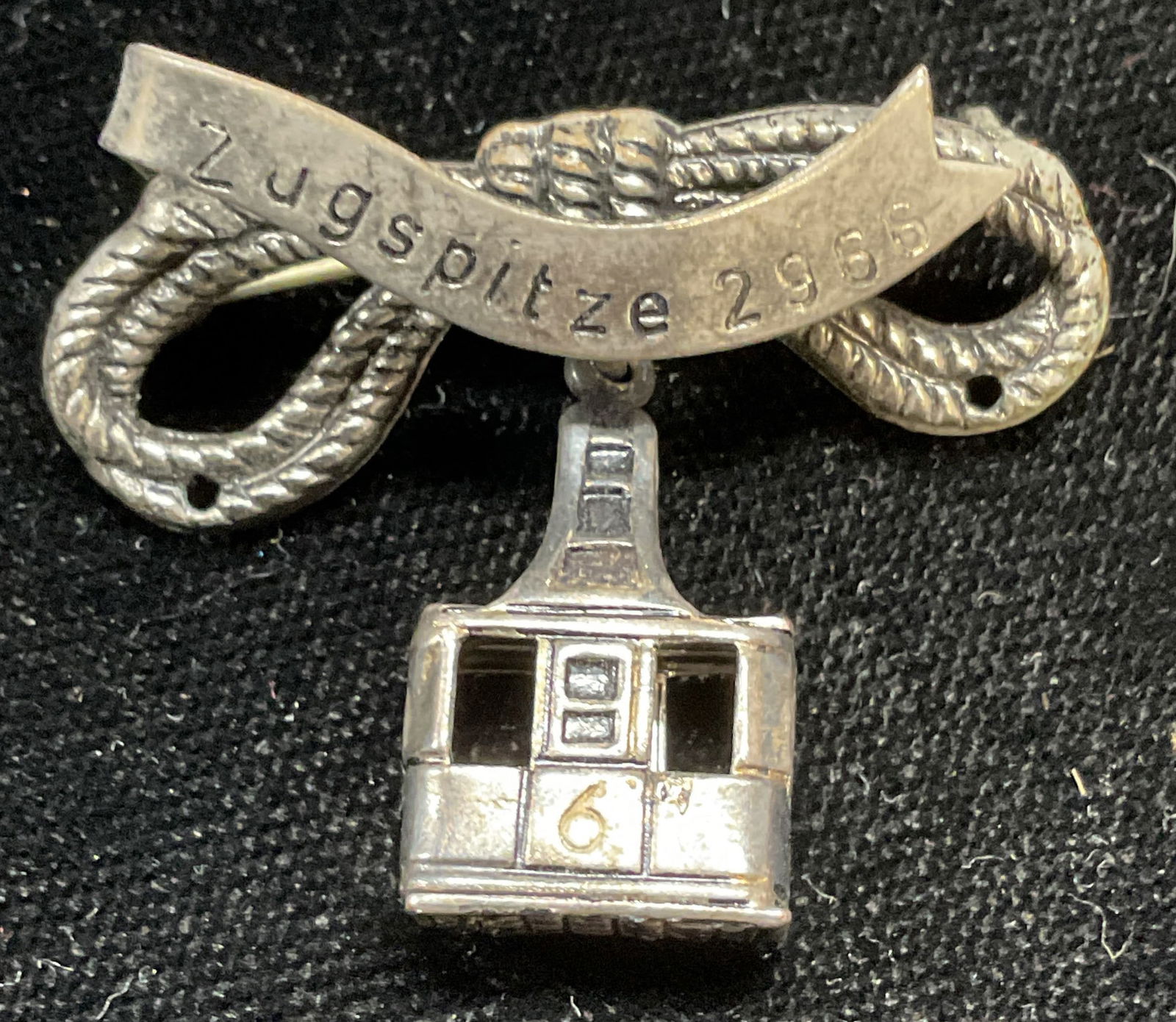 Vtg German Zugspitze Cable Car Brooch: Vintage silver tone German souvenir brooch. Zugspitze mountain, cable car motif. Measures approx 1.25 x 1.5 inches. Some wear including scratching. Jewelry, estate jewelry, costume jewelry, cocktail j