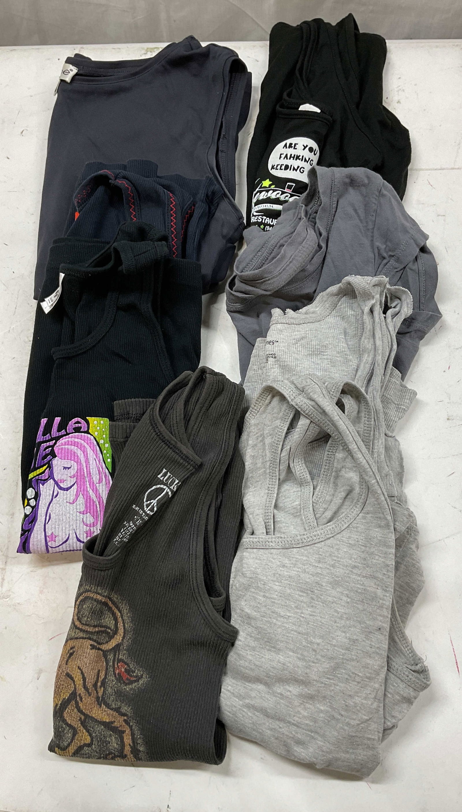 Lot 8 Lucky, Bebe, No Boundaries+ Tops USA+: Lot of 8 tops. Mix of tank tops and short sleeve shirts. Lucky grey lion graphic tank top, ribbed with the word Leo, size S/M, cotton material, made in USA. Grey tank top, size S, cotton material. No