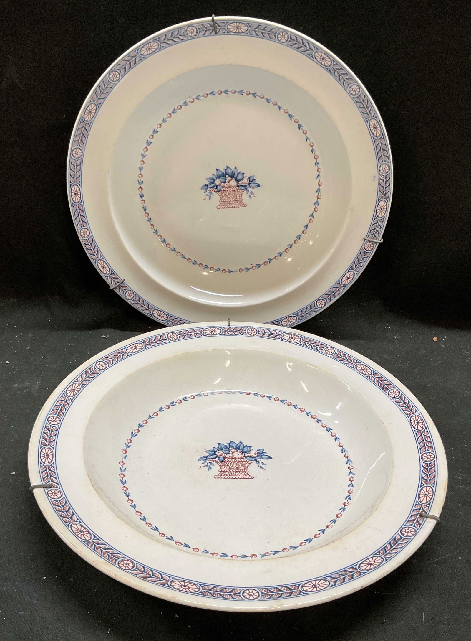 Pair Vtg Wedgwood Boston Ceramic Bowls England: Pair of vintage, possibly antique, c. 1920s Wedgwood ceramic bowls. Boston pattern. Rd and blue with fruit design. Signed. Made in England. Measure approx 9.5 x 1.5 inches. Wear including crazing and