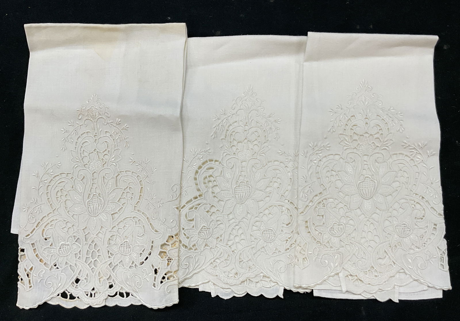 Set 3 Vintage White Embroidered Linen Tea Towels: Set of 3 vintage white embroidered linen tea towels. Linen material. Embroidered floral motifs. Ornate scroll designs. Scalloped trim. Measures approx 12 x 17 1/2 inches. Blemishes and discoloration d
