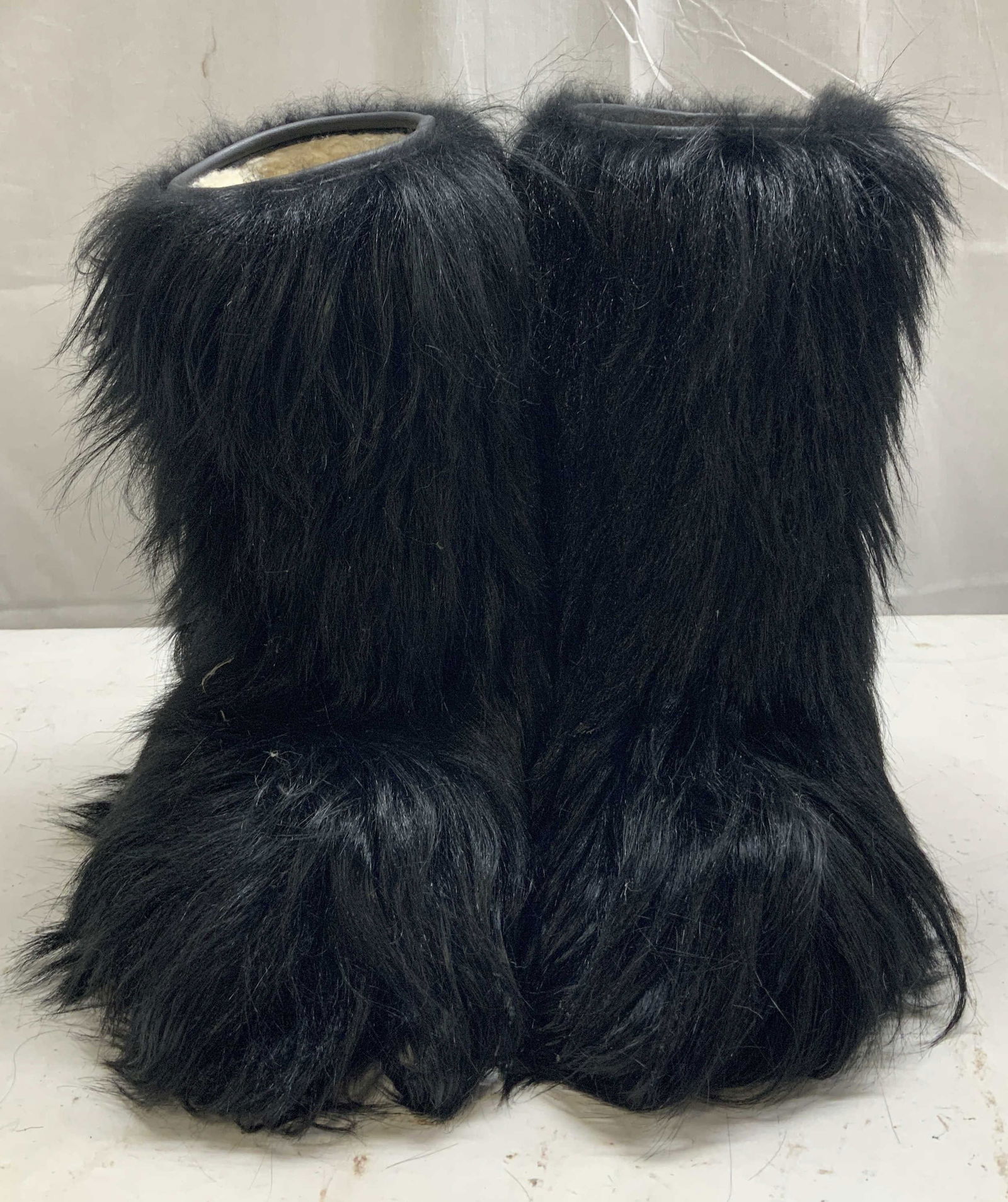 Modes Power Black Fur Ankle Boots ITALY: Boots are leather upper & sole synthetic. Boots are entirely covered in long, dense, shaggy black fur. Signed & marked. Reads, MODES. POWER 38. MADE IN ITALY. Surface wear consistent to age, use & exp