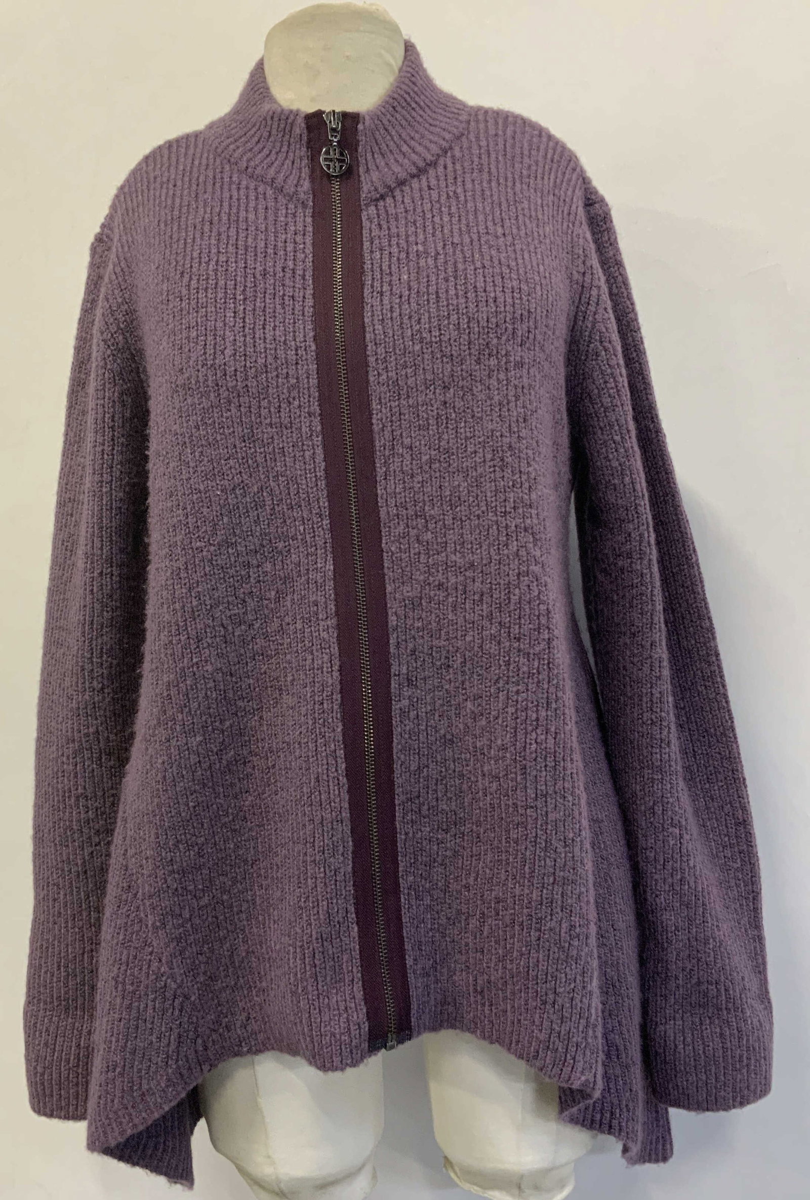 Linea By Louis Dell Olio Purple Zip Up Cardigan: Jacket is size medium. 75% acrylic & 25% polyester. Jacket is purple tone & features a full length zip up closure. Vertical ribbing style. Signed & marked. Reads, LINEA BY LOUIS DELL OLIO. Surface wea
