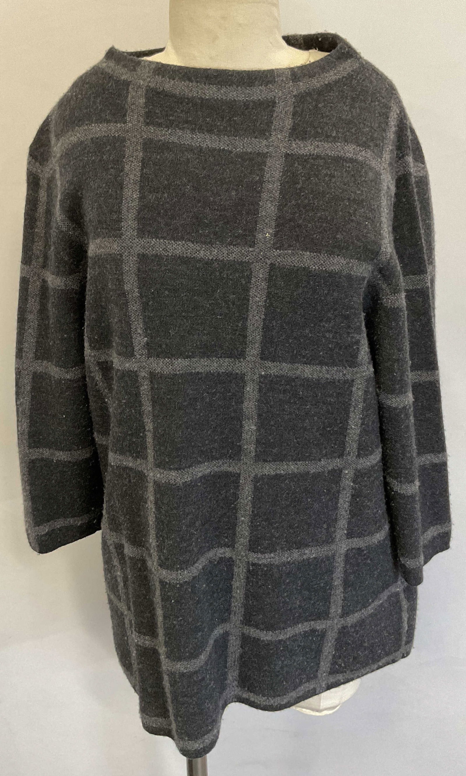 Eileen Fisher Black & Grey Checkered Sweater: Eileen Fisher black and grey checkered sweater. Size M. Merino wool material. Checker pattern with black background and grey horizontal and vertical lines. Wear consistent with exposure. Some blemishe