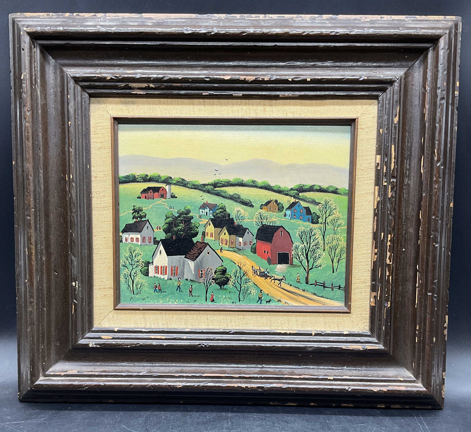 Signed Klein Americana Farm Village Oil Painting: Framed Americana oil onboard painting. Signed lower right, partially visible, Klein. Inscribed on verso Klein, other inscriptions illegible. Farm village scene with buildings and landscape. Wood frame