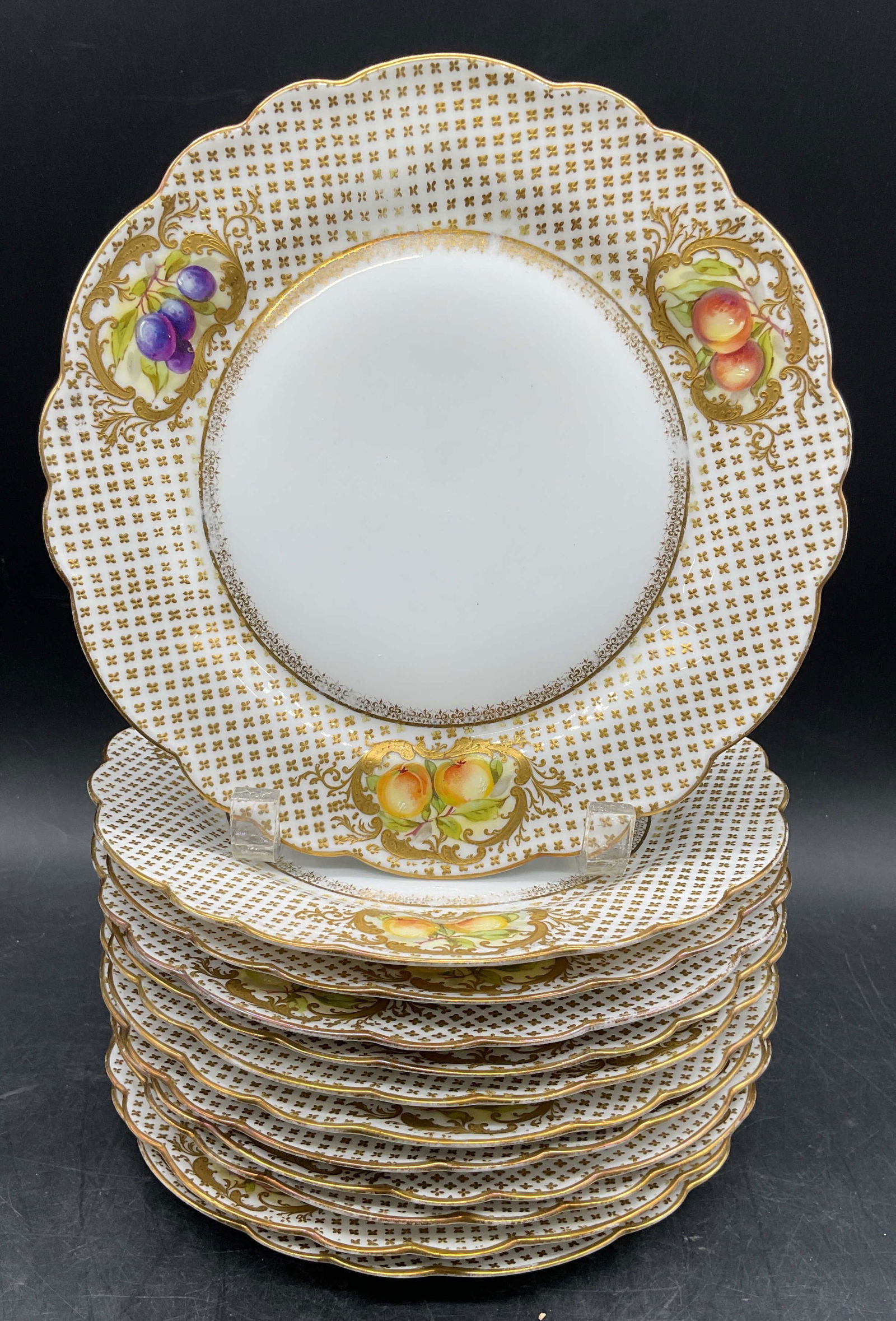 Set12 Antq Hamilton & Clark Limoges Porc Plates Frnc: Set of 12 antique porcelain plates. Hand decorated Limoges porcelain produced for Hamilton & Clark, Pittsburgh, Pennsylvania. Gilt patterned rims with fruit motifs. Scalloped edges. Measures approx 8.