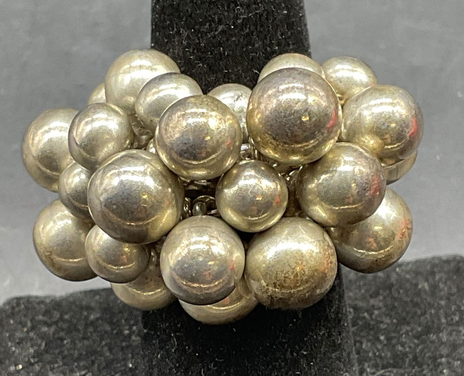 Vintage Sterling Silver Cluster Beaded Ring: Vintage sterling silver ring with cluster beaded band. Marked sterling. Ring size 6. Total weight 25.9 grams. Some scratching. Jewelry, estate jewelry, fine jewelry, cocktail jewelry, fashion jewelry,
