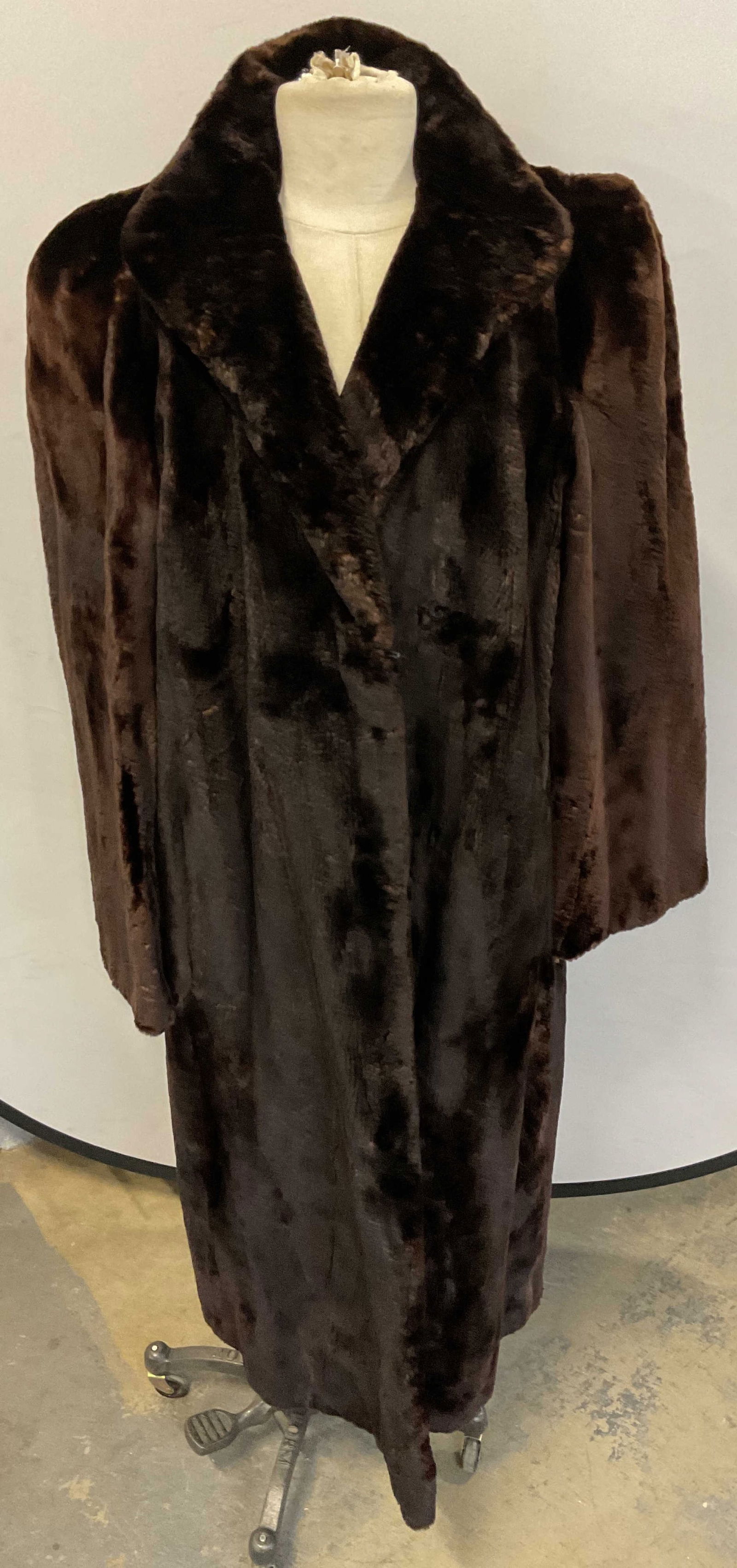 Vintage Philip Reiner Mink Fur Full Length Coat: Vintage Philip Reiner full length brown sheared mink fur coat. Fur clip front closure. Fully lined. Measures approx 20 inches across chest, 49 inches from shoulder to hem. Some losses to fur. Philip R