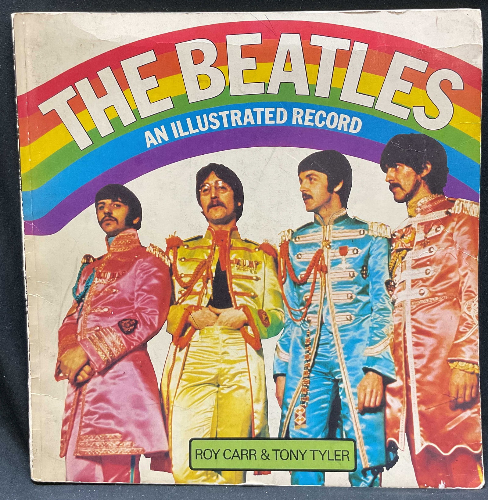 The Beatles An Illustrated Record Carr&Tyler 1975: The Beatles An Illustrated Record by Roy Carr and Tony Tyler. Published by Harmony Books, 1975. Soft cover book with illustrated cover. Book includes text and illustrations about The Beatles. Measures