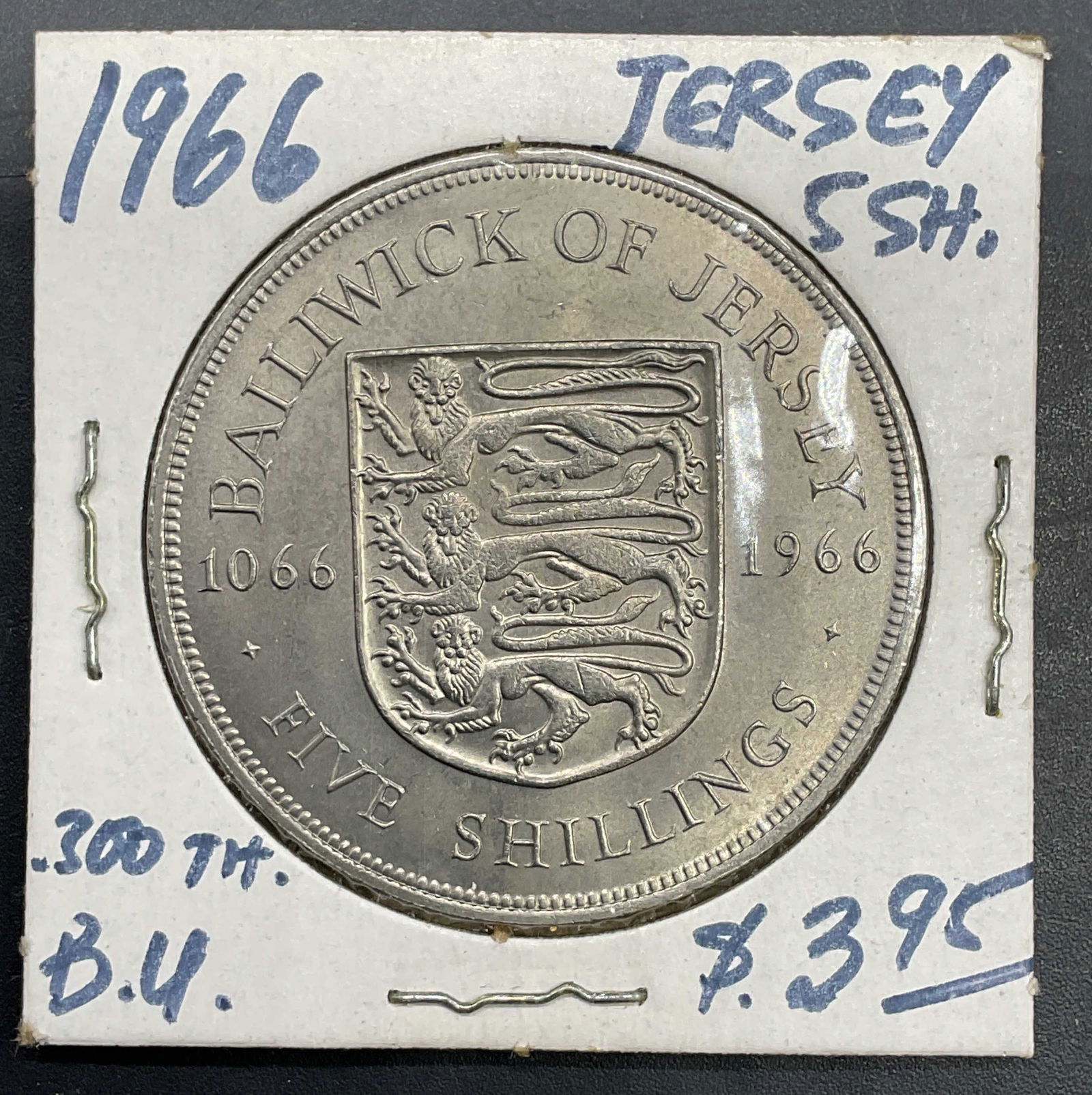 1966 Jersey Battle of Hastings 5 Shilling Coin: 1966 Jersey 5 shilling coin commemorating the 900th anniversary of the Battle of Hastings. Copper nickel alloy. Reverse features the Arms of Jersey, obverse features bust of Queen Elizabeth II. Measur