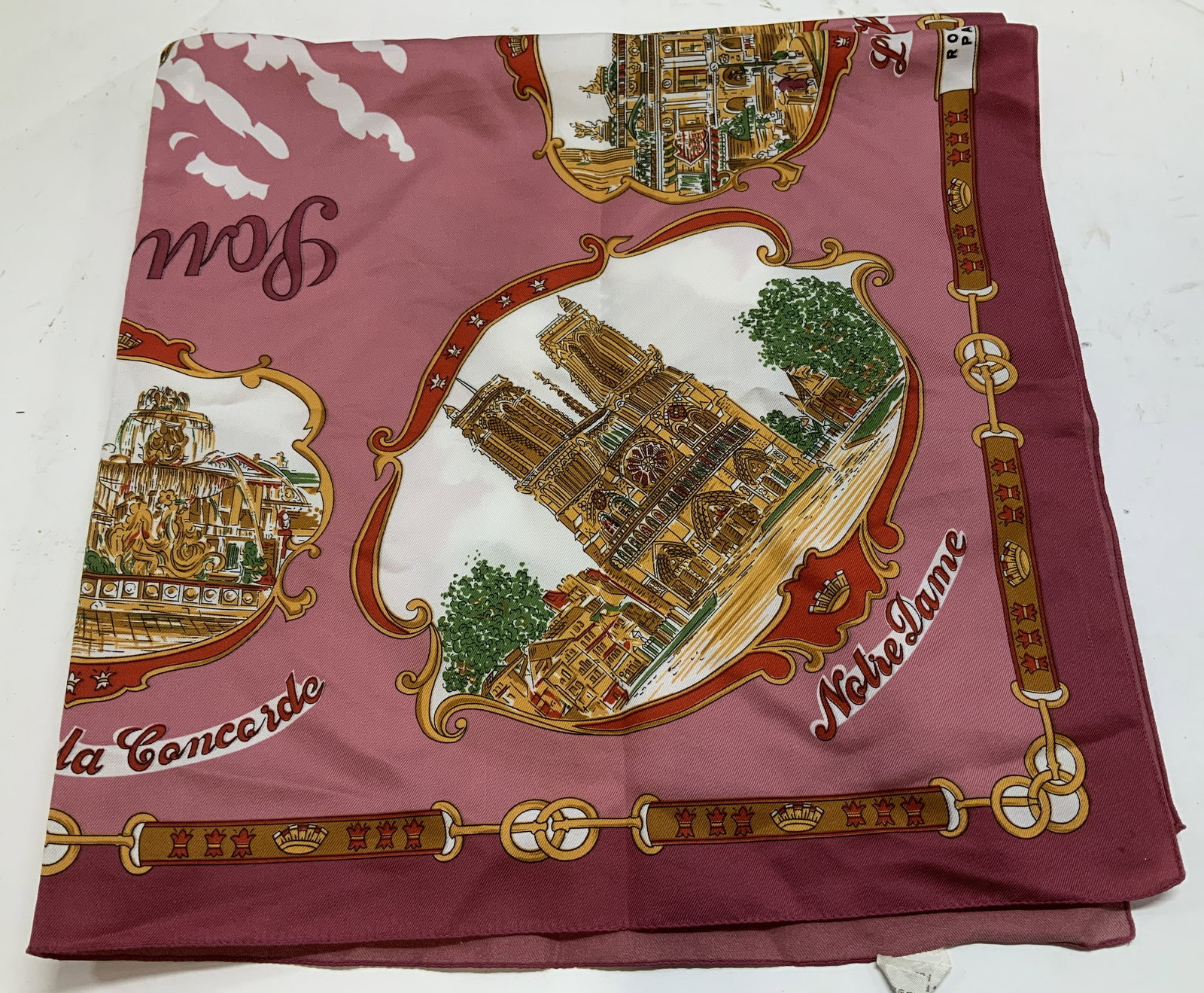 Vntg Roger L. Lahmy Souvenir de Paris Scarf ITALY: Scarf is 100% polyester. Vintage Roger L. Paris Souvenir de Paris square scarf, in pink with depictions of Parisian landmarks. Shades of pink, green, yellow, red. Property of opera singers estate from