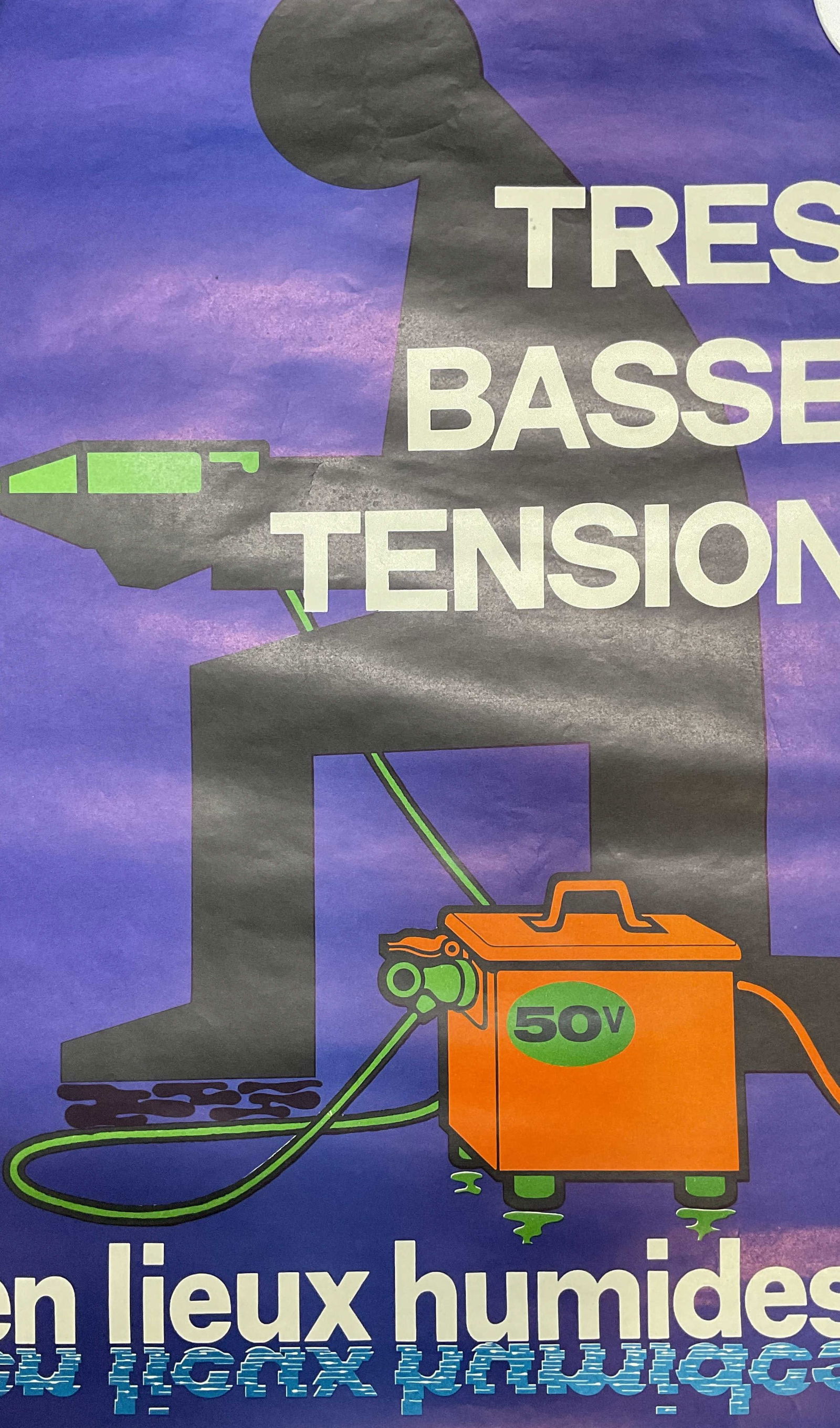 1971 French Industrial Safety Poster 23in: Framed lithograph poster on paper. Vintage 1971 French industrial safety poster. Issued by the National institute for Research and Security to promote workplace accident prevention. Low Voltage In Wet