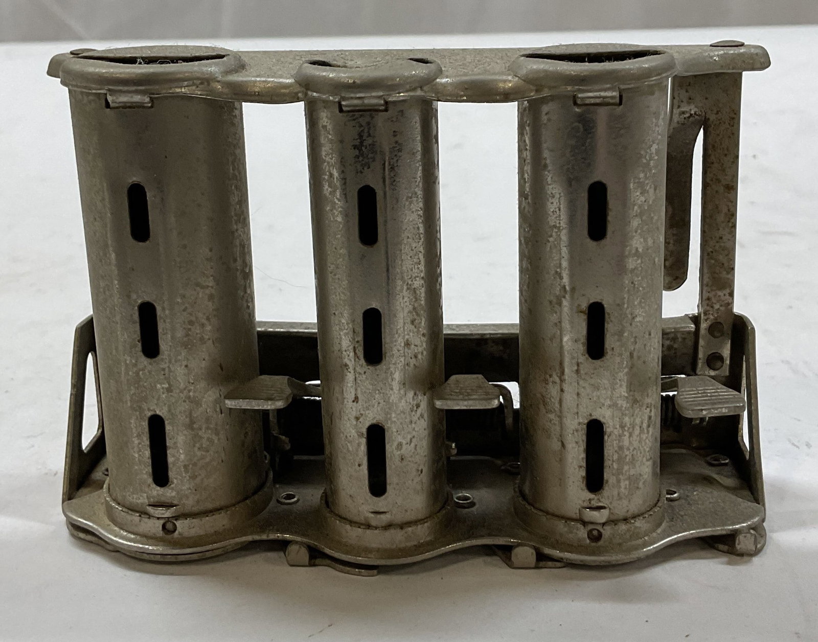 Vintage McGill Paragon 3 Barrel Coin Changer USA: Vintage McGill Paragon three barrel metal coin changer. Surface engraved with text, reads as follows McGill Made In USA J.L. Galef & Son 85 Chambers St. New York, N.Y. Sole Distributor Paragon Changer