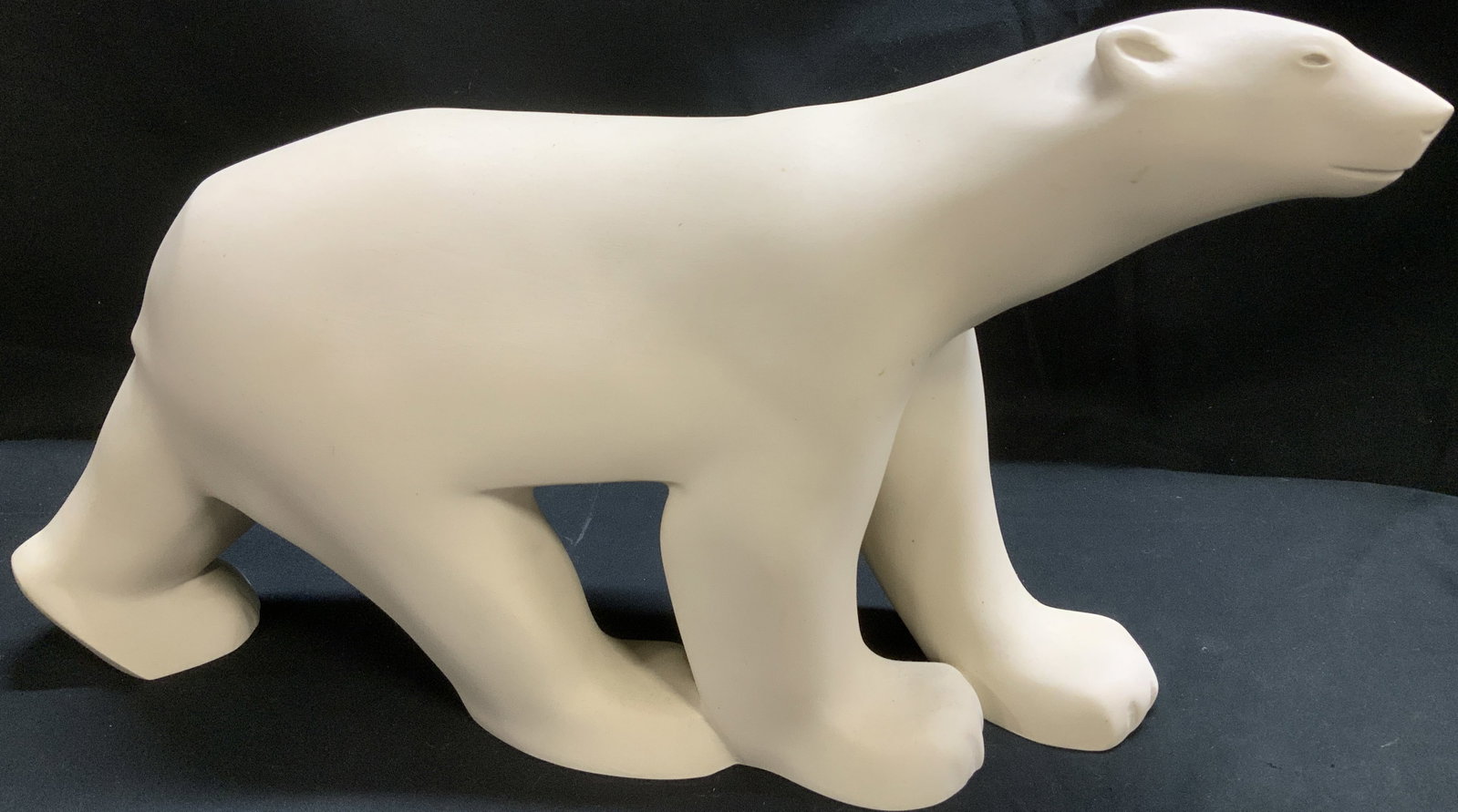 Metro Museum of Art White Polar Bear Sculpture: Sculpture depicts a white matte polar bear in a walking position. Visible ears, eyes & mouth. Piece is composite. Property of Upper East Side French stage & screen actors Estate, Manhattan. Signed & m