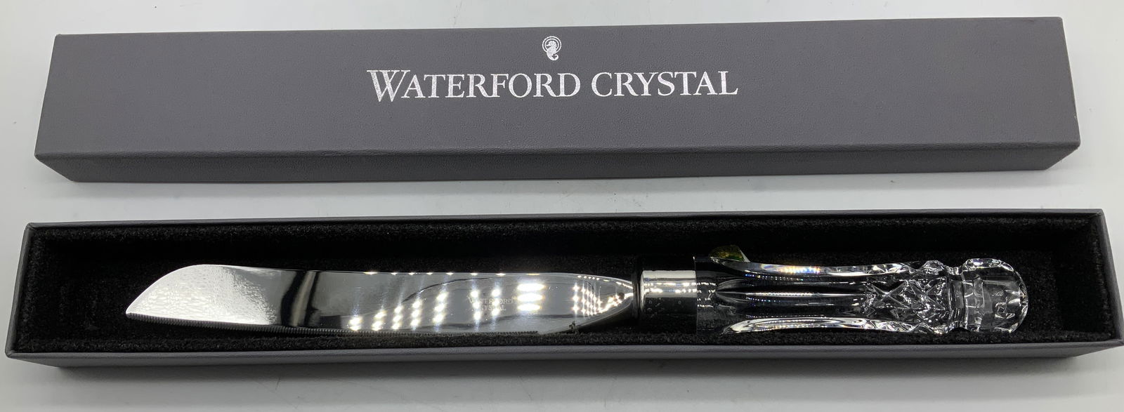 Waterford Crystal Lismore Bridal Knife IRELAND: Lot includes, Waterford Crystal lismore bridal knife with an elegant diamond & wedge cut crystal handle. Blade is stainless steel. Comes with original box. Surface wear consistent to age, use & exposu