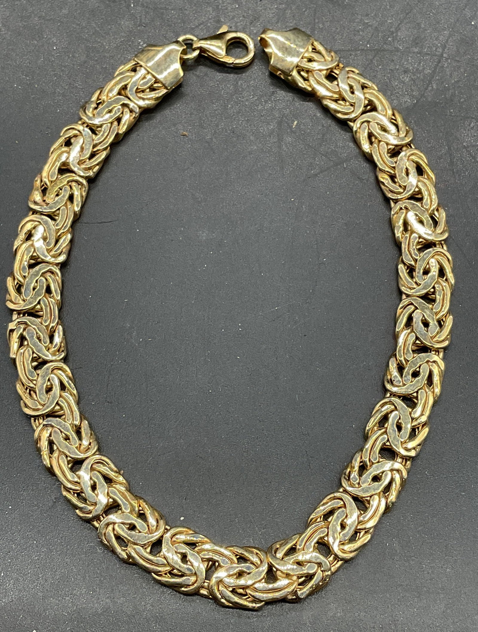 Signed AK 10K Gold Byzantine Chain Bracelet: Signed AK 10k gold Byzantine chain bracelet. Made in Turkey. Measures approx 7.25 inches long. Marked 10k. Total weight 5 grams. Some scratching. Jewelry, estate jewelry, fine jewelry, cocktail jewelr