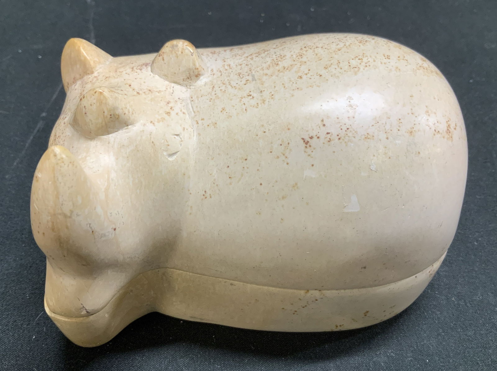 Hand Carved Soapstone Hippopotamus Trnk Box: Hand-carved hippopotamus trinket box. Appears to be possible soapstone. Light tone. Surface wear consistent to age, use & exposure. Measurements: length 4.5in x width 3.2in x height 3.2in. Hand carved