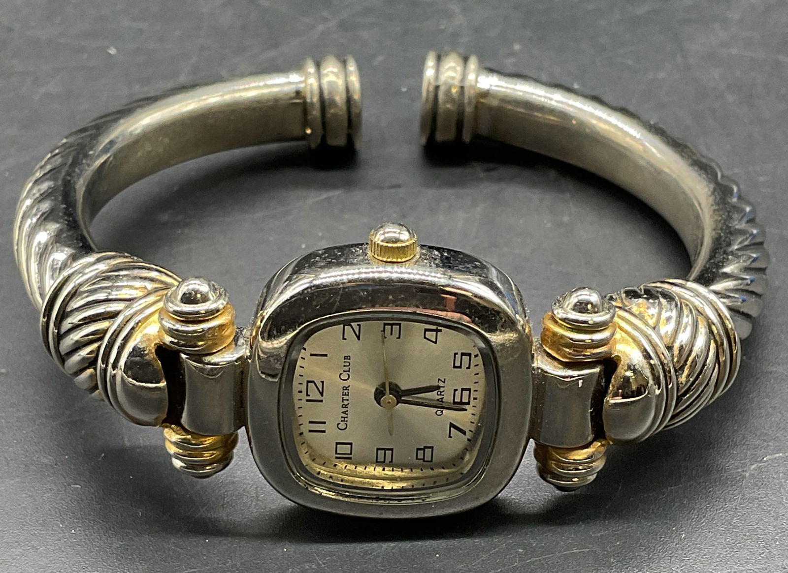 Charter Club Silver Tone Cable Wristwatch: Signed Charter Club silver and gold tone cable band bracelet wristwatch. Measures approx 2 inches wide. Not tested. Some scratching. Jewelry, estate jewelry, costume jewelry, cocktail jewelry,