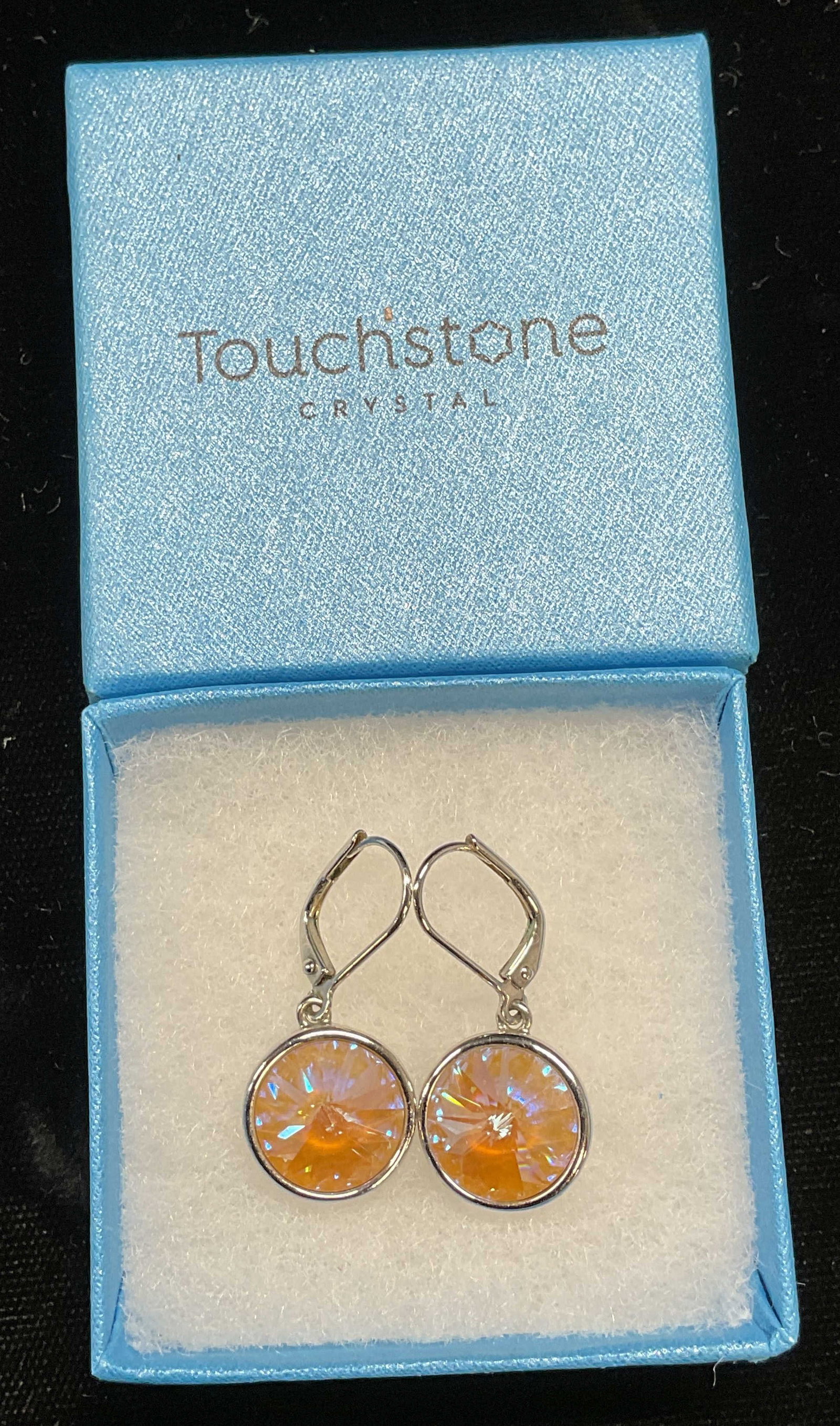 Swarovski Touchstone Orange Crystal Earrings: Touchstone by Swarovski silver tone earrings with orange crystals. Signed. Like new in box. Drop length approx 15 inches. Some scratching. Jewelry, estate jewelry, costume jewelry, cocktail