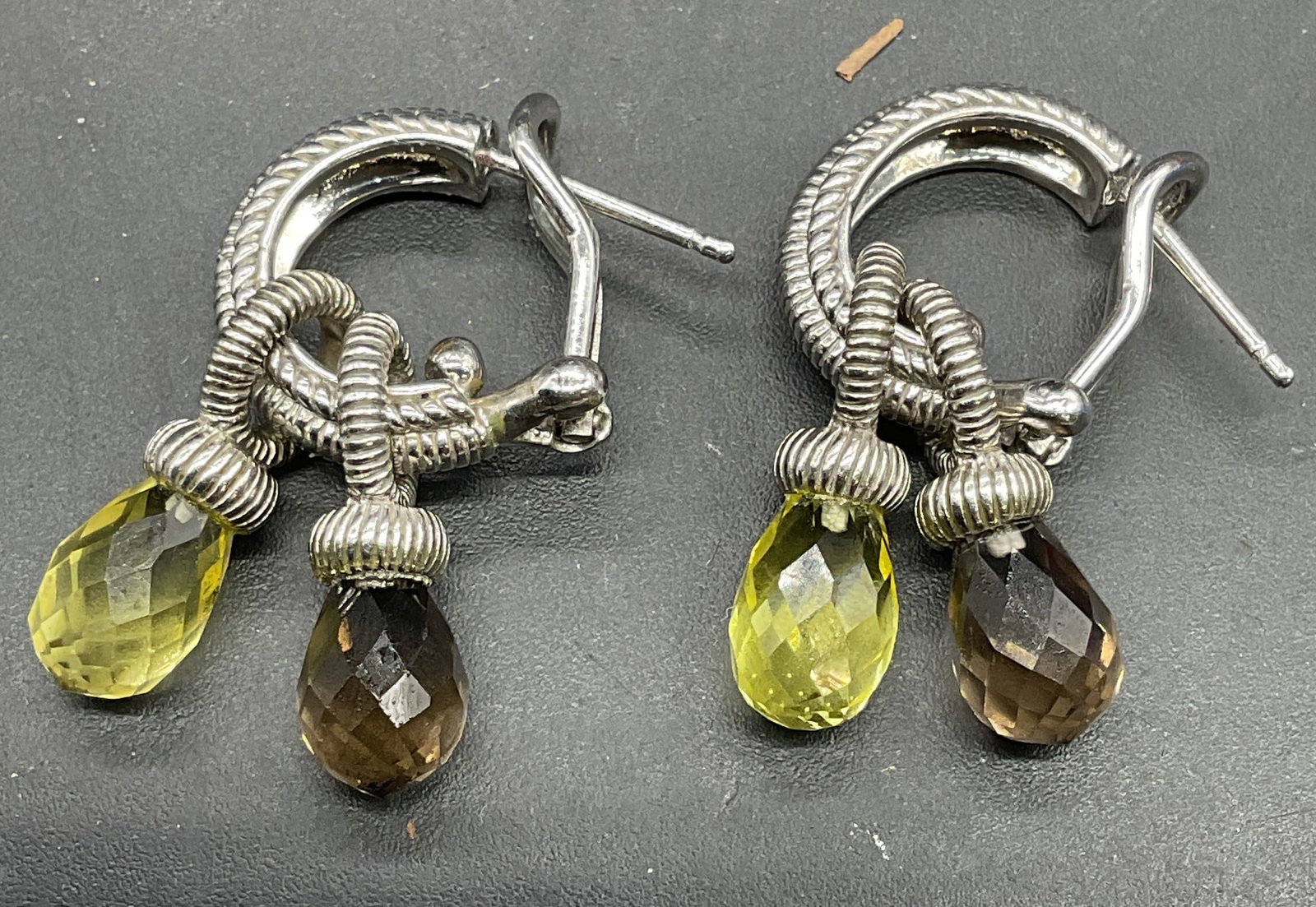 Judith Ripka Sterling Silver Semiprecious Earrings: Signed Judith Ripka sterling silver cable hoop earrings with semiprecious stone pendants. Measure approx 1 inch long. Total weight 8.6 grams. Marked sterling. Some scratching. Jewelry, estate jewelry,