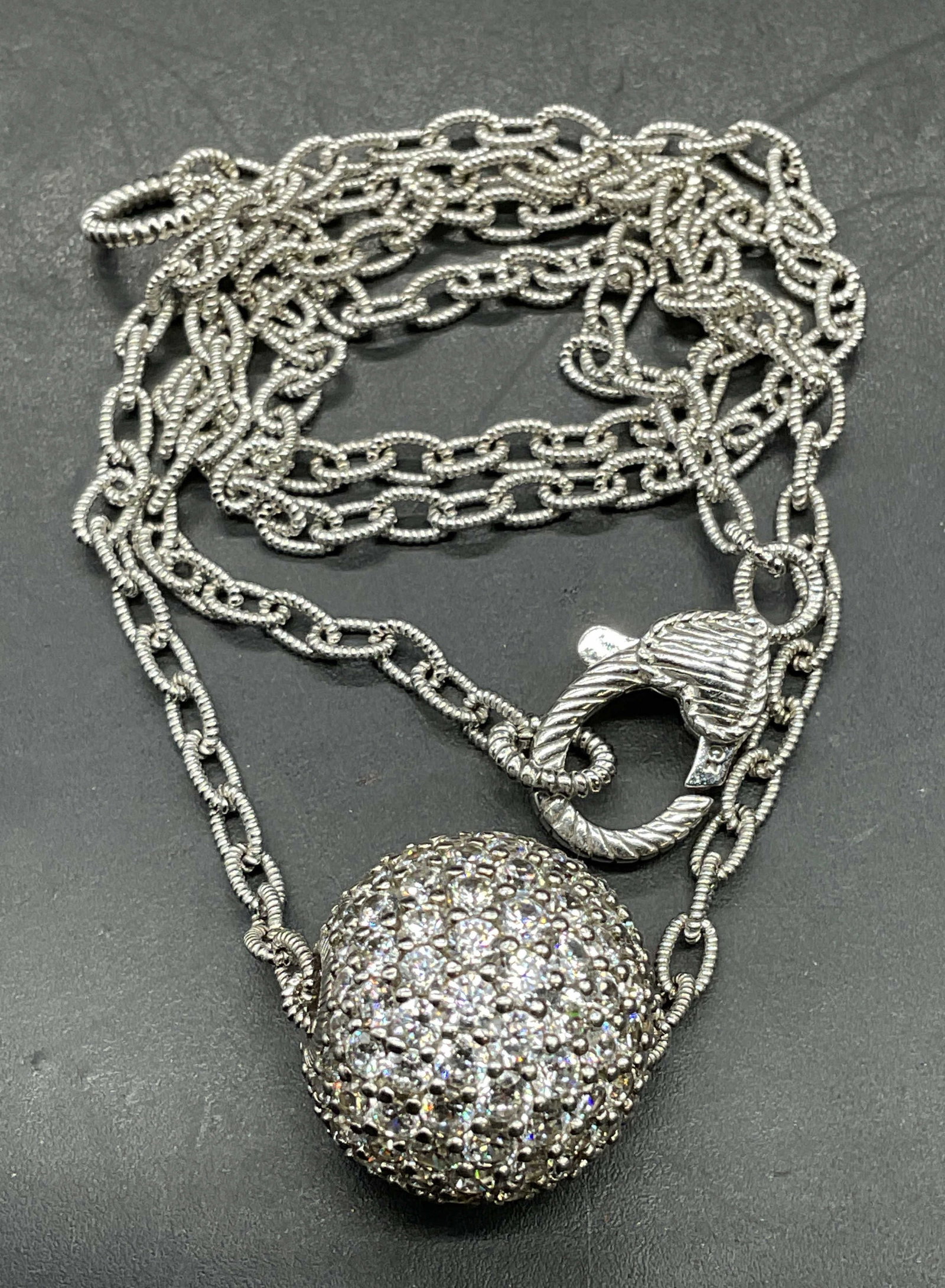 Judith Ripka Sterling Silver Semiprecious Necklace: Signed Judith Ripka sterling silver necklace with lavender semiprecious ball pendant. Drop length approx 9 inches. Total weight 15.3 grams. Marked sterling. Some scratching. Jewelry, estate jewelry, f