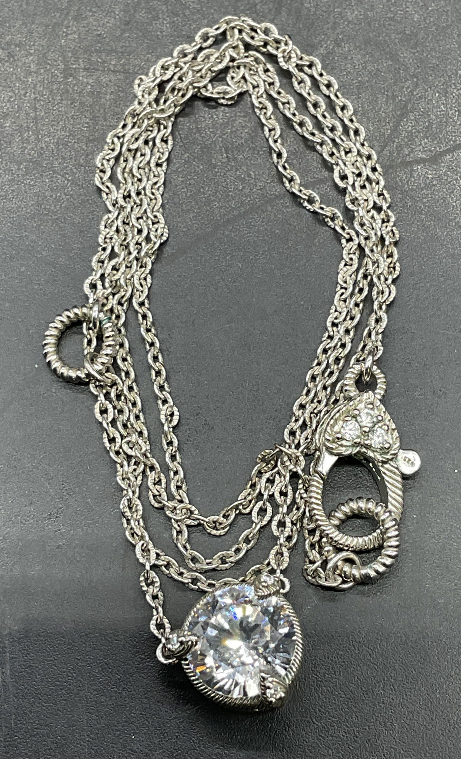 Judith Ripka Sterling Silver Semiprecious Necklace: Signed Judith Ripka sterling silver necklace with semiprecious stone pendant. Drop length approx 9.75 inches. Total weight 5.1 grams. Marked sterling. Some scratching. Jewelry, estate jewelry, fine je