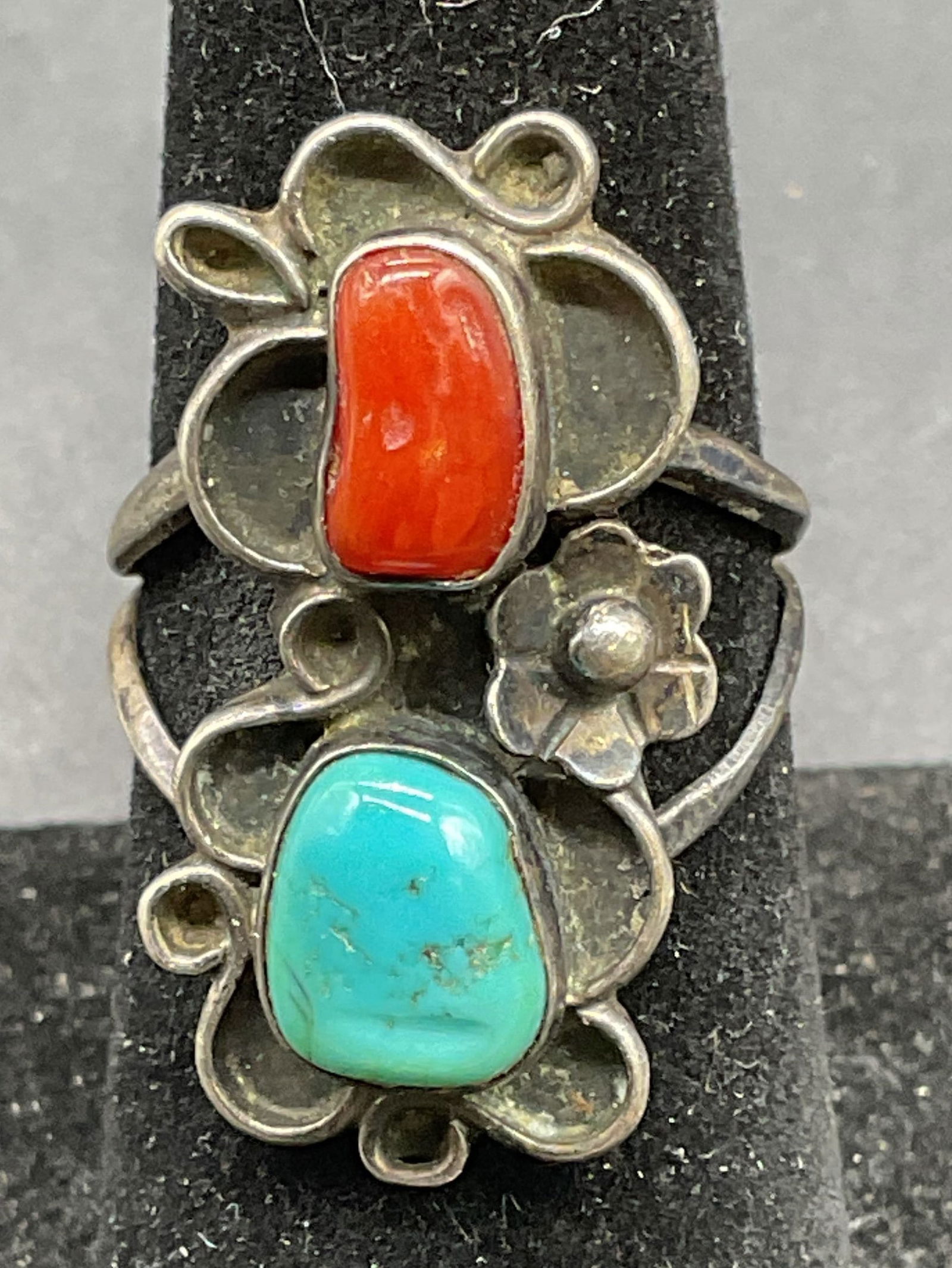 Signed NC Sterling Silver Turquoise Coral Ring: Signed NC sterling silver floral ring with turquoise and coral. Ring size 6.5. Total weight 4.4 grams. Tested for sterling. Some scratching. Jewelry, estate jewelry, fine jewelry, cocktail jewelry, fa