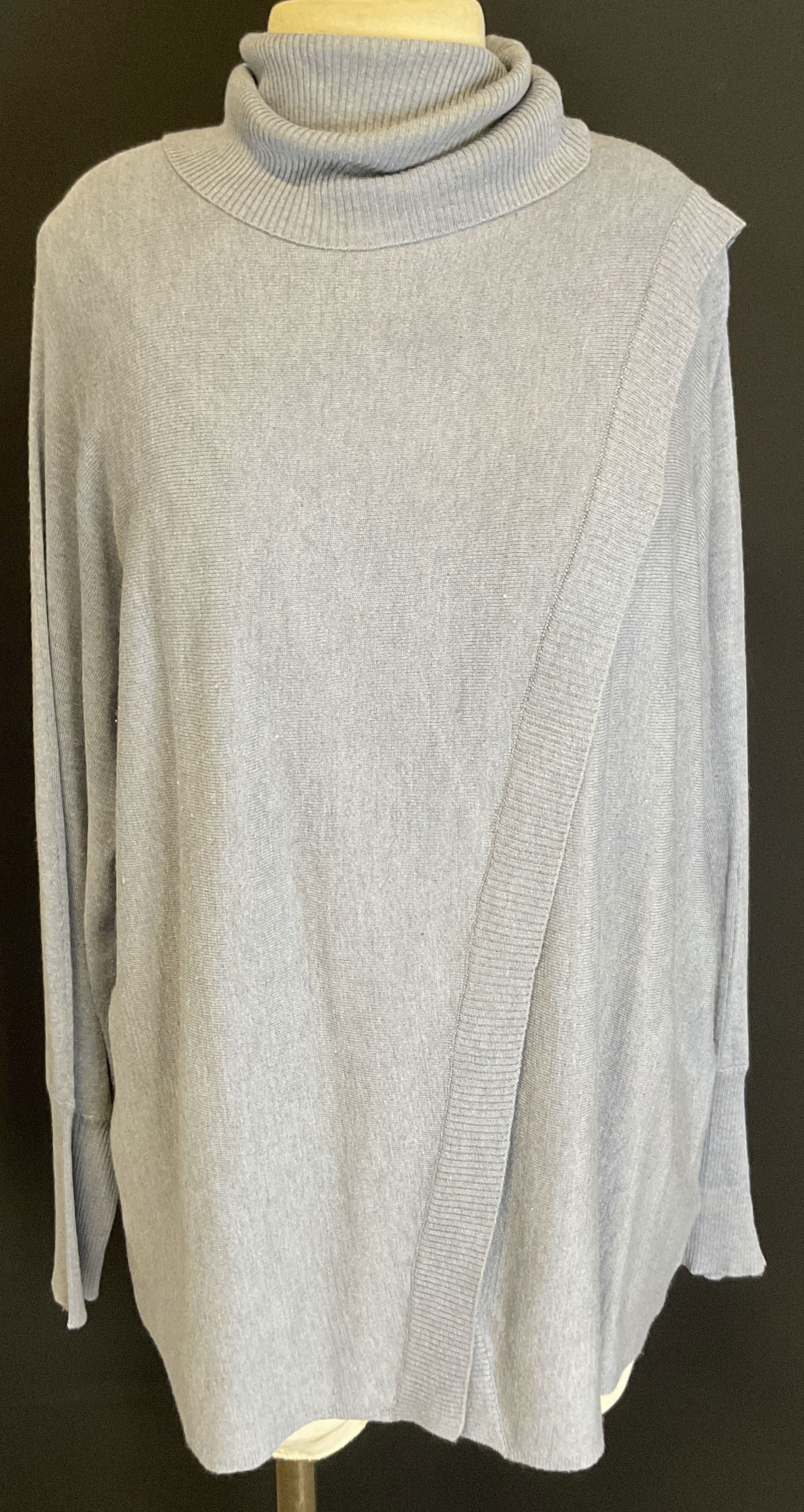 Poetry Blue Turtleneck Cross Sweater: Poetry blue turtleneck cross sweater. Size 10. Silk and cashmere material. Fabric crosses in front. Ribbed trim. Light blue with turtleneck. Wear consistent with exposure. Sweater, turtleneck sweater,